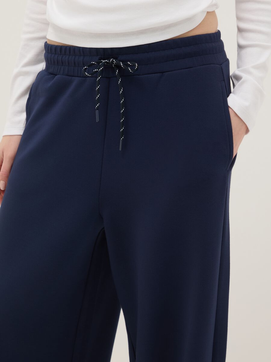 Blue wide leg trousers in stretch modal blend_3