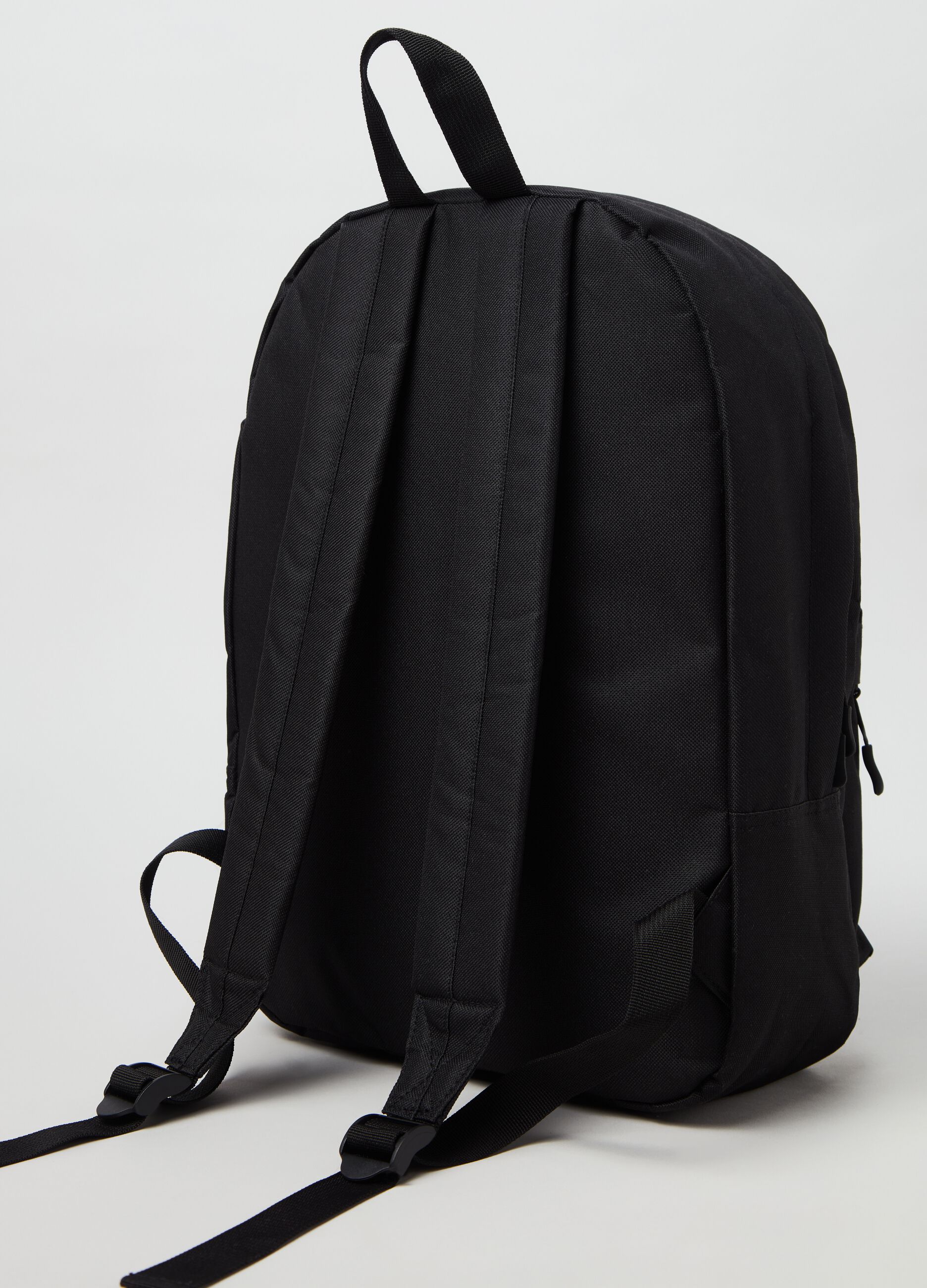 Backpack with external pocket