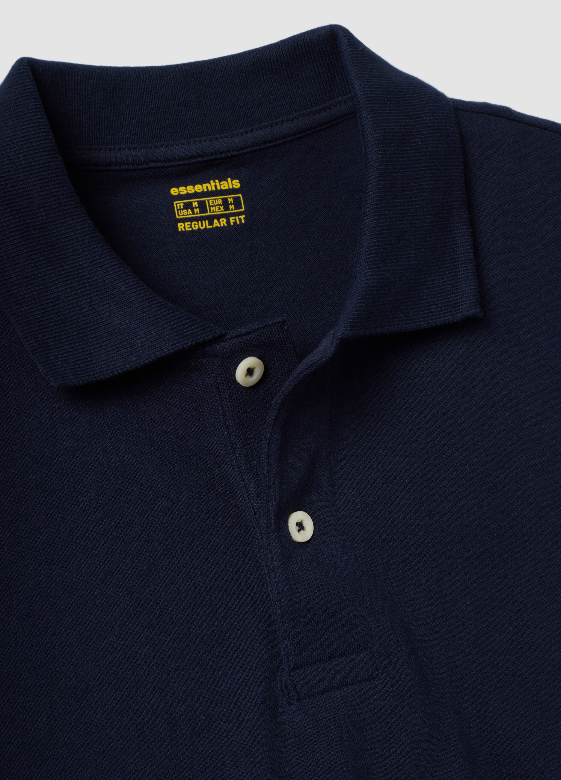 Blue pure cotton piqu&eacute; polo shirt with classic collar and regular fit