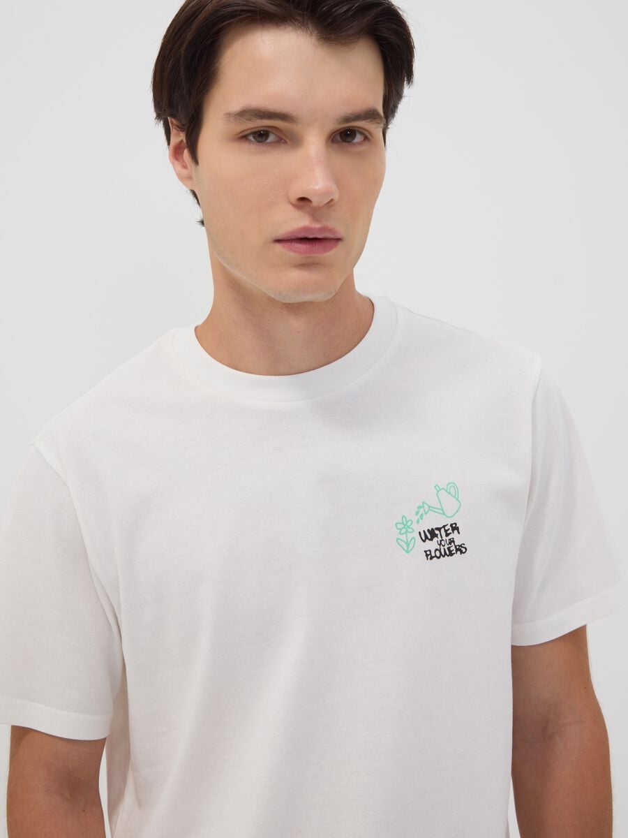 White pure cotton jersey T-shirt with "Water your Flowers" print, regular fit_1