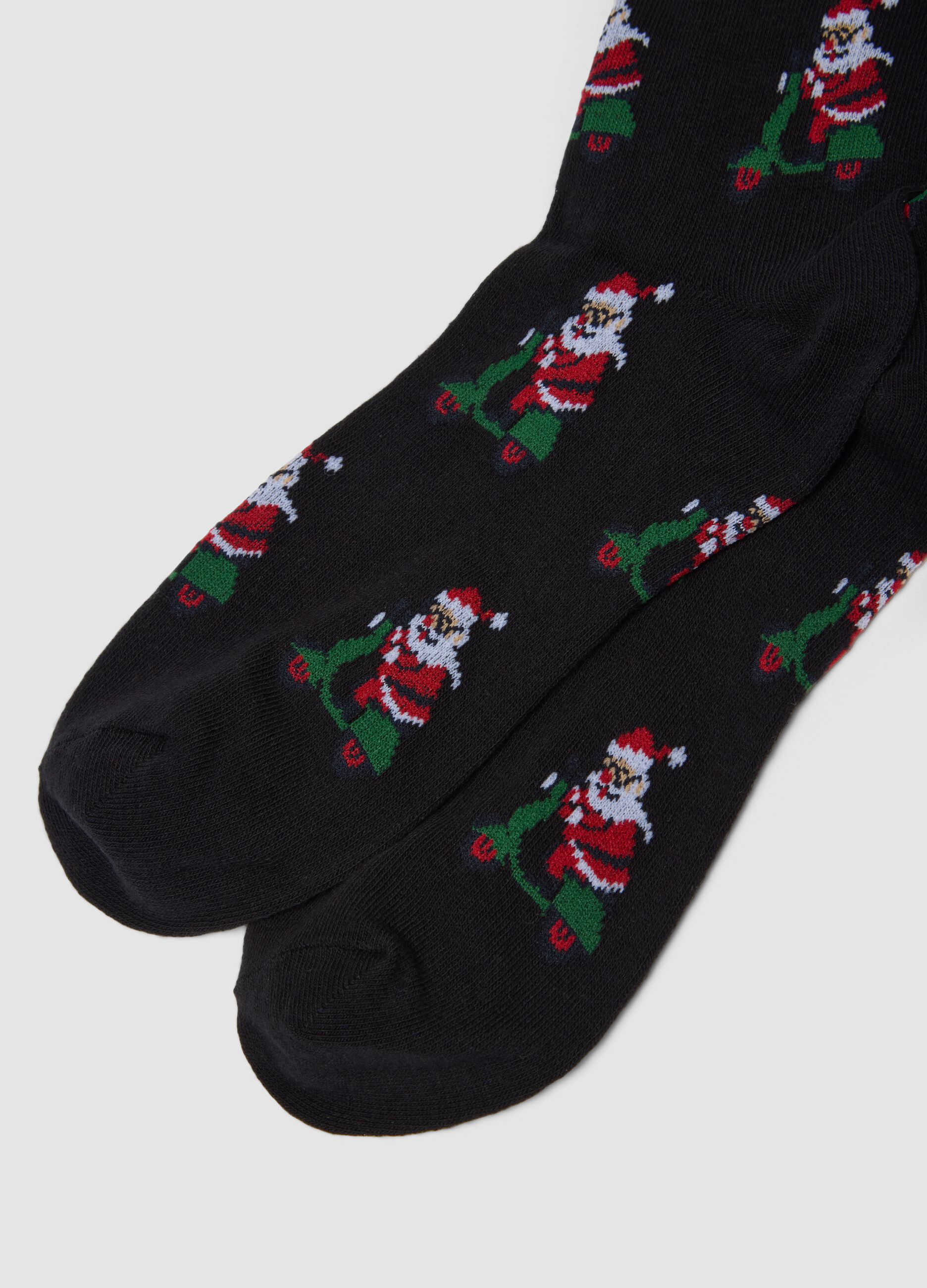 Meias altas pretas em algod&atilde;o el&aacute;stico com estampado de Natal