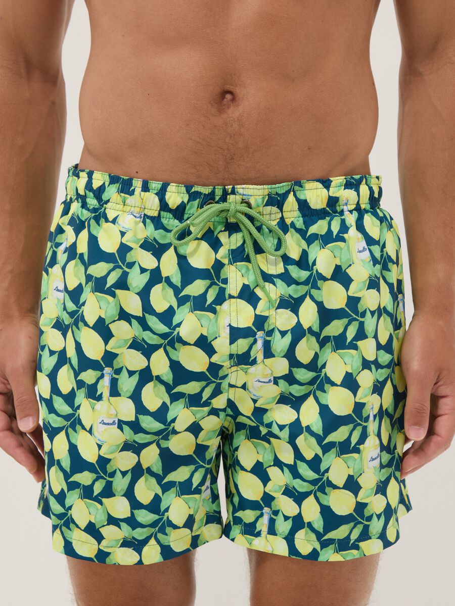 Blue boxer swim shorts with Limoncello print_1