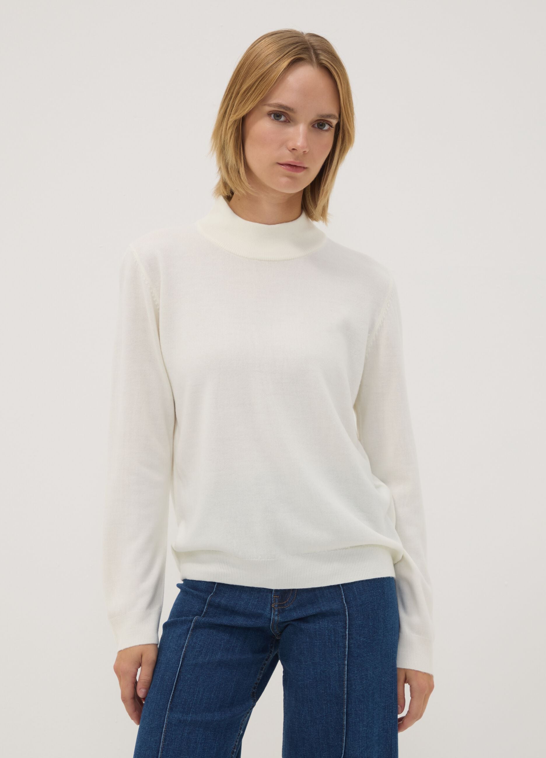 White long-sleeved top with high neck, regular fit