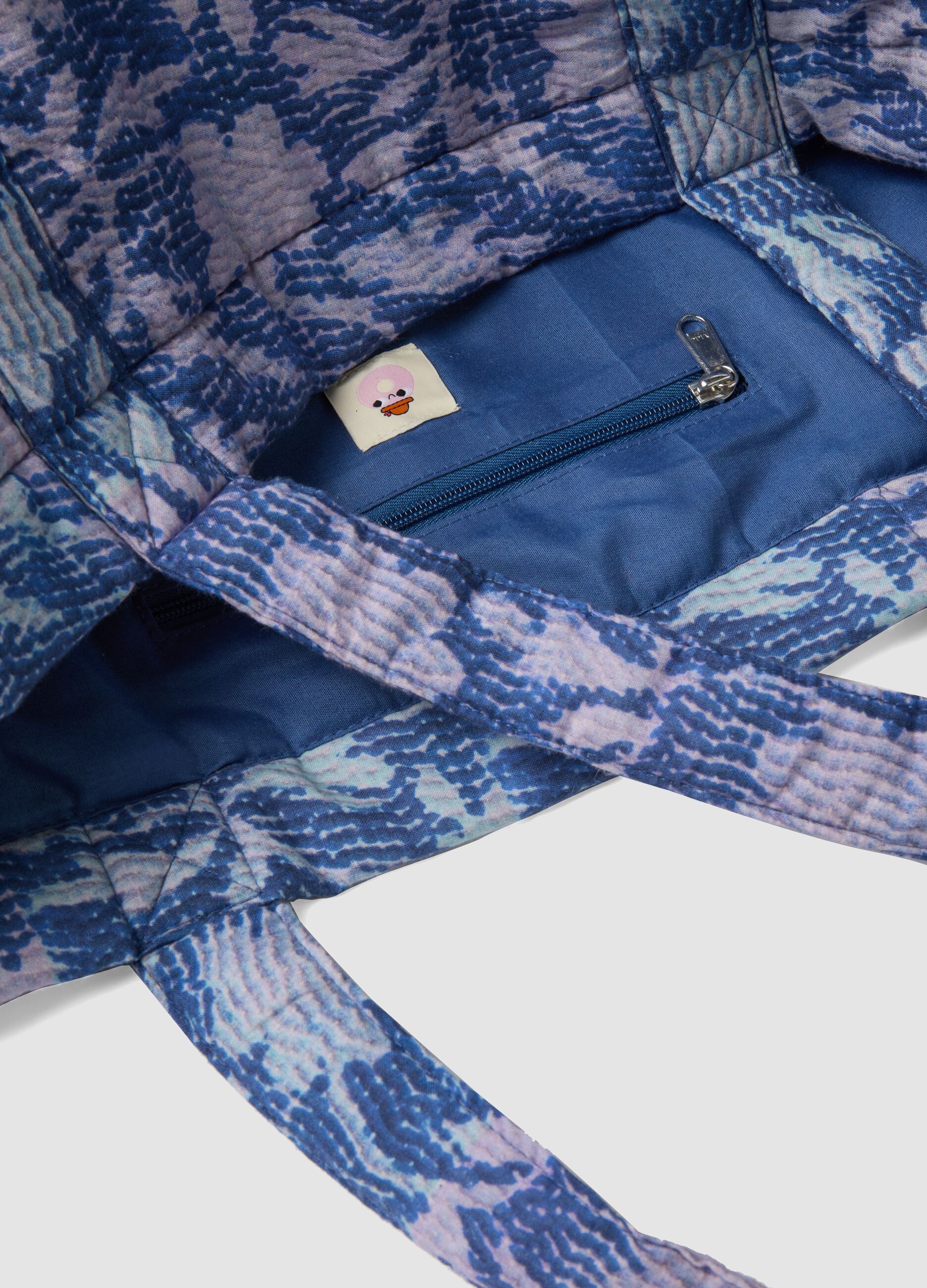 Blue quilted pure cotton beach bag with floral pattern