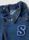 Blue stretch cotton jeans with varsity-style appliqu&eacute;s for baby boy_2