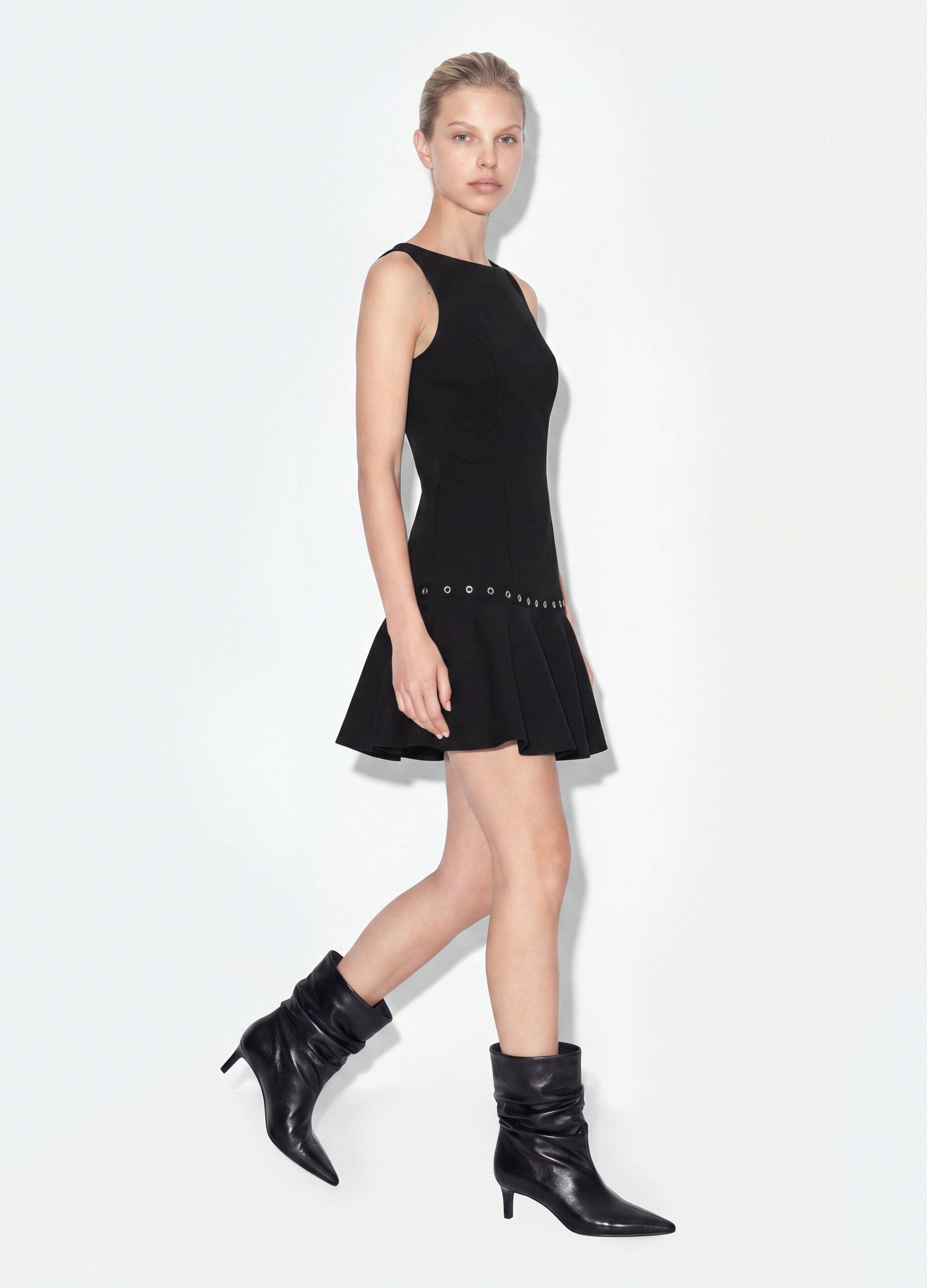 Black sleeveless stretch viscose dress with eyelets