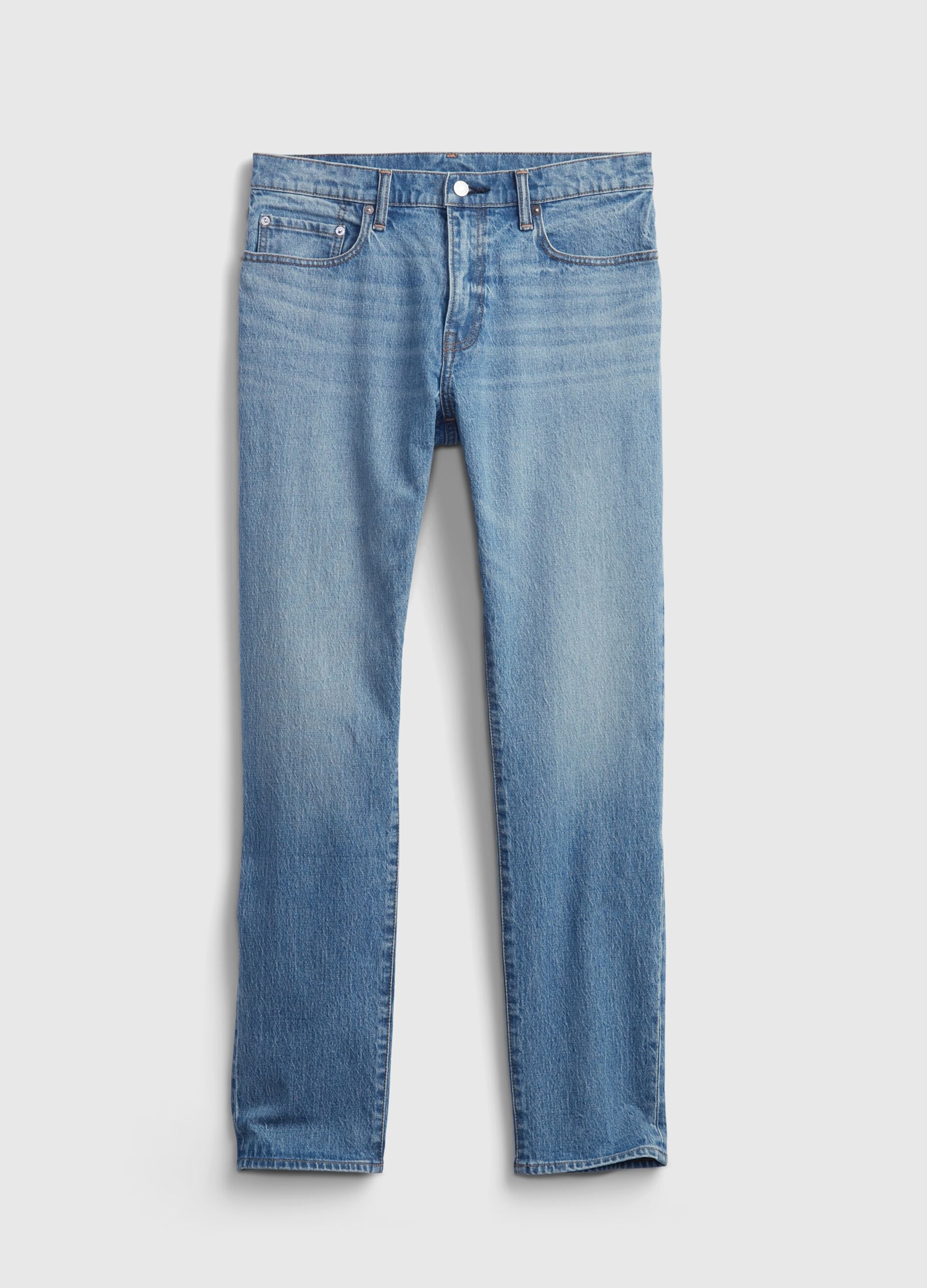 Jeans slim fit vita media con scoloriture