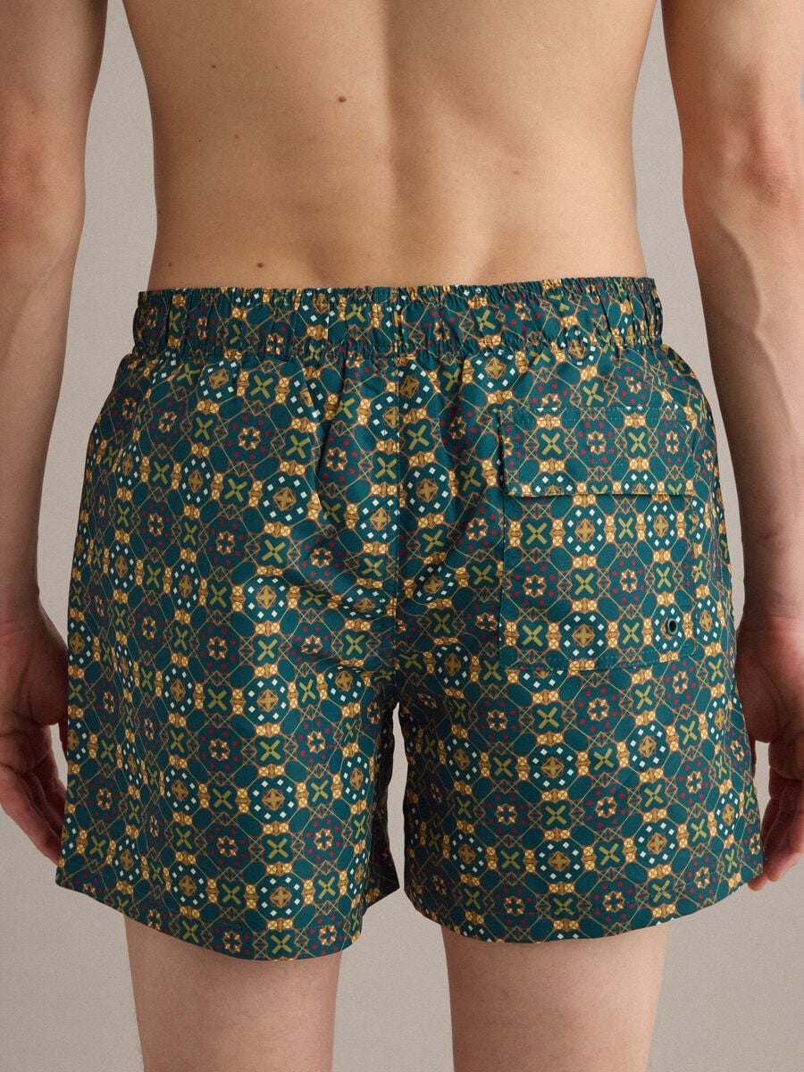 Green patterned swim shorts with elasticated waist_3