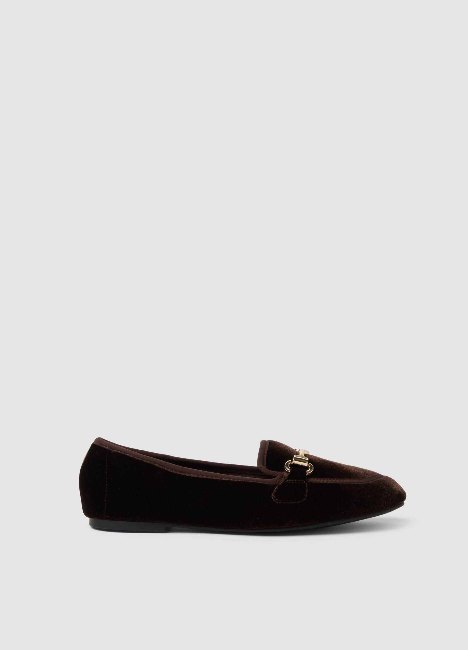 Brown loafers with gold-tone horsebit
