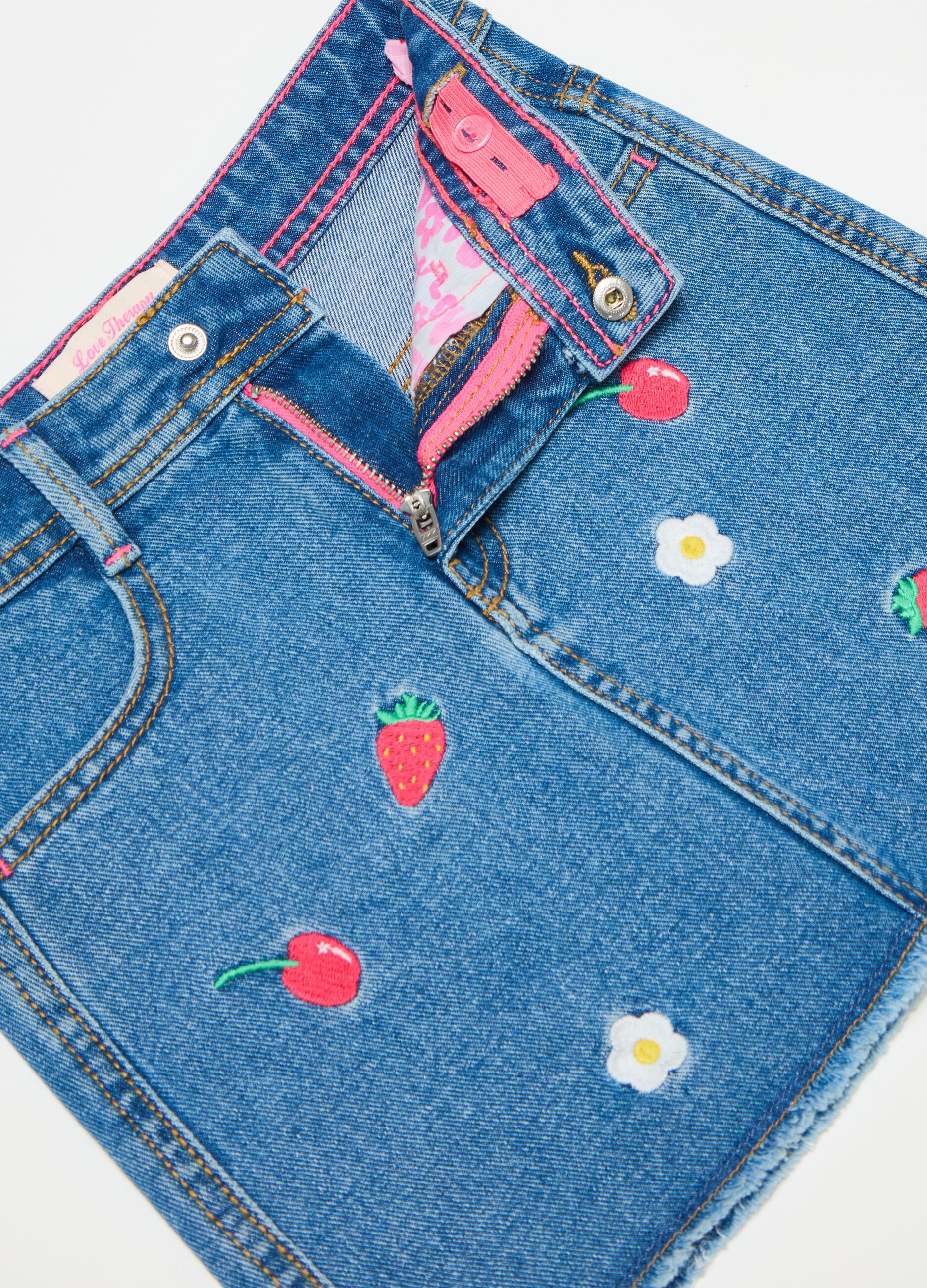 Denim miniskirt with fruit embroidery