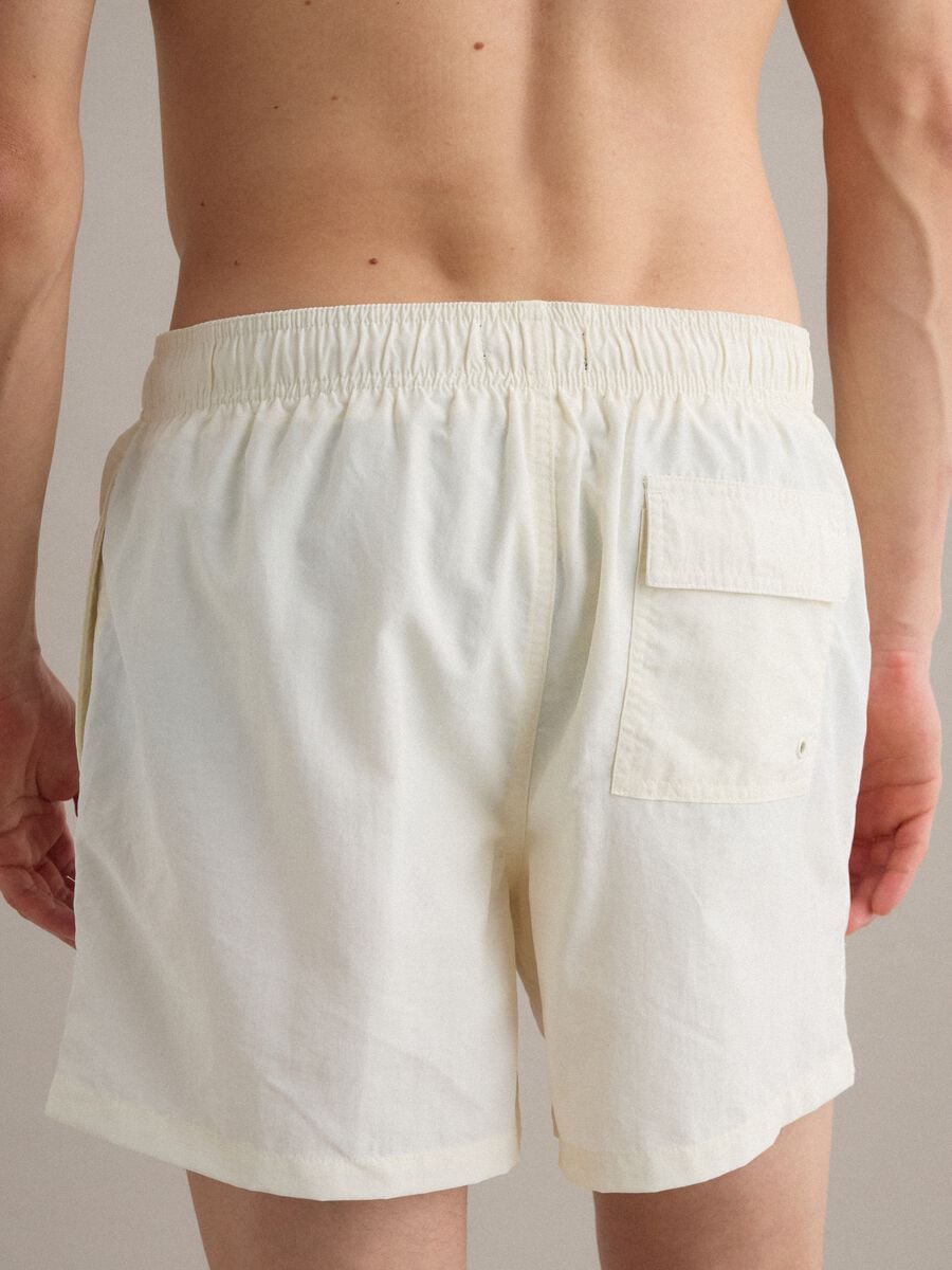 White swim shorts with elasticated waistband and drawstring_3