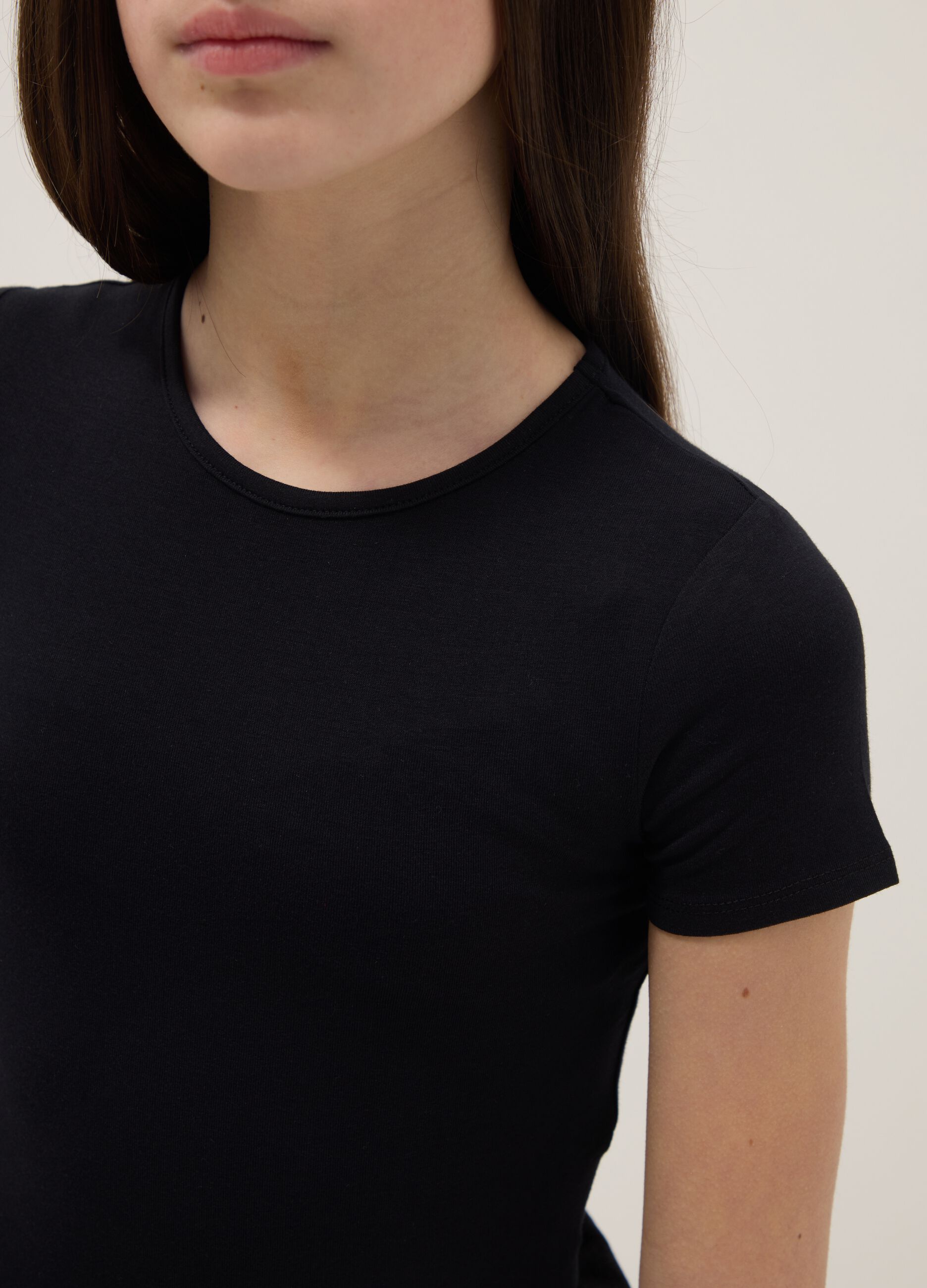 Girls' fitted black stretch cotton bodysuit