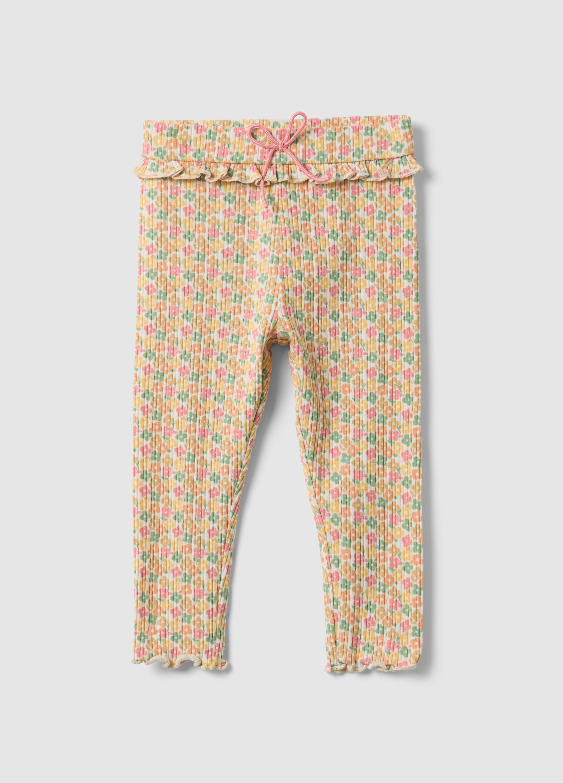 Leggings de menina slim fit em algod&atilde;o el&aacute;stico com padr&atilde;o floral