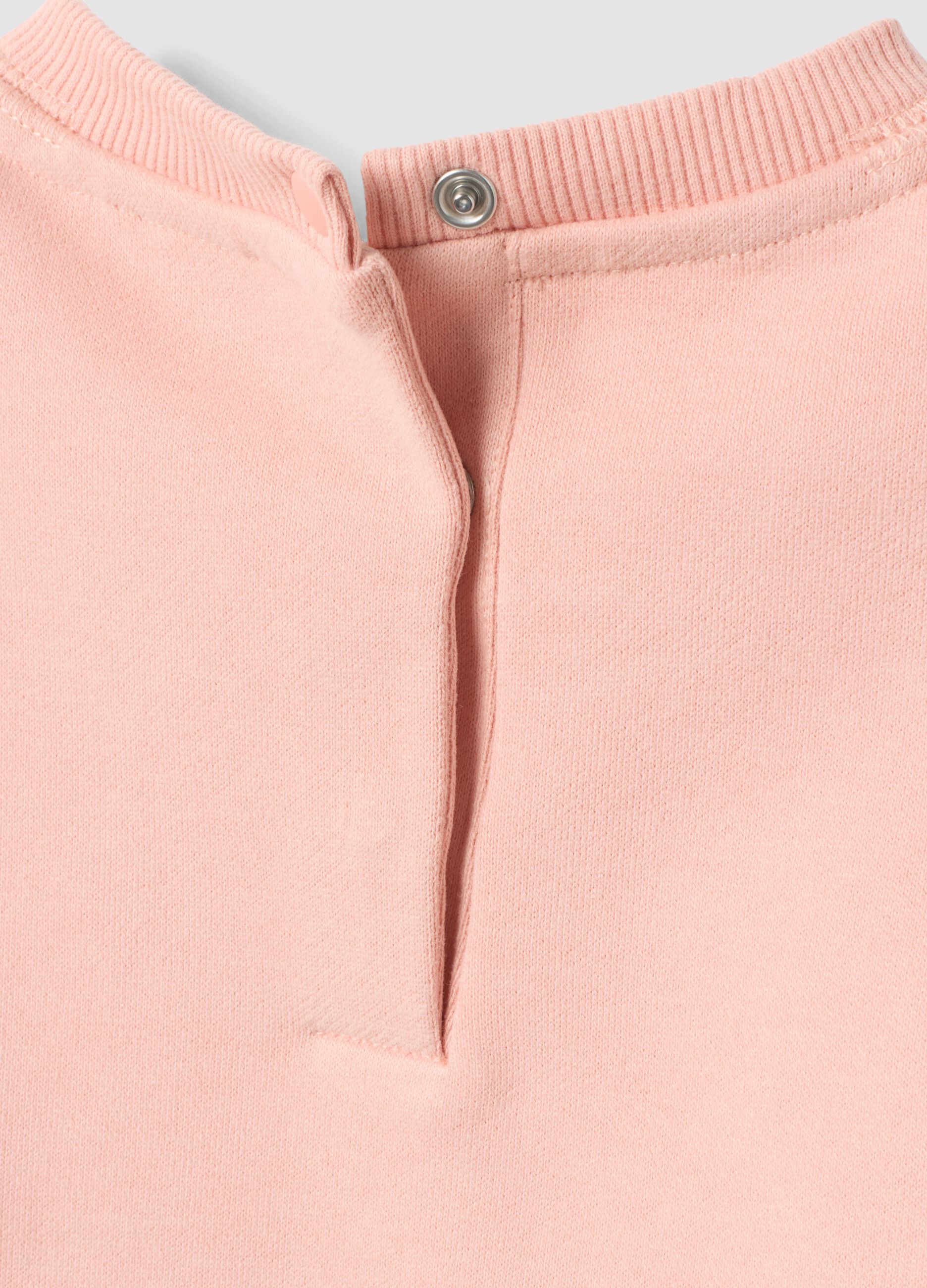 Felpa rosa chiaro in puro cotone con fiocchi e girocollo