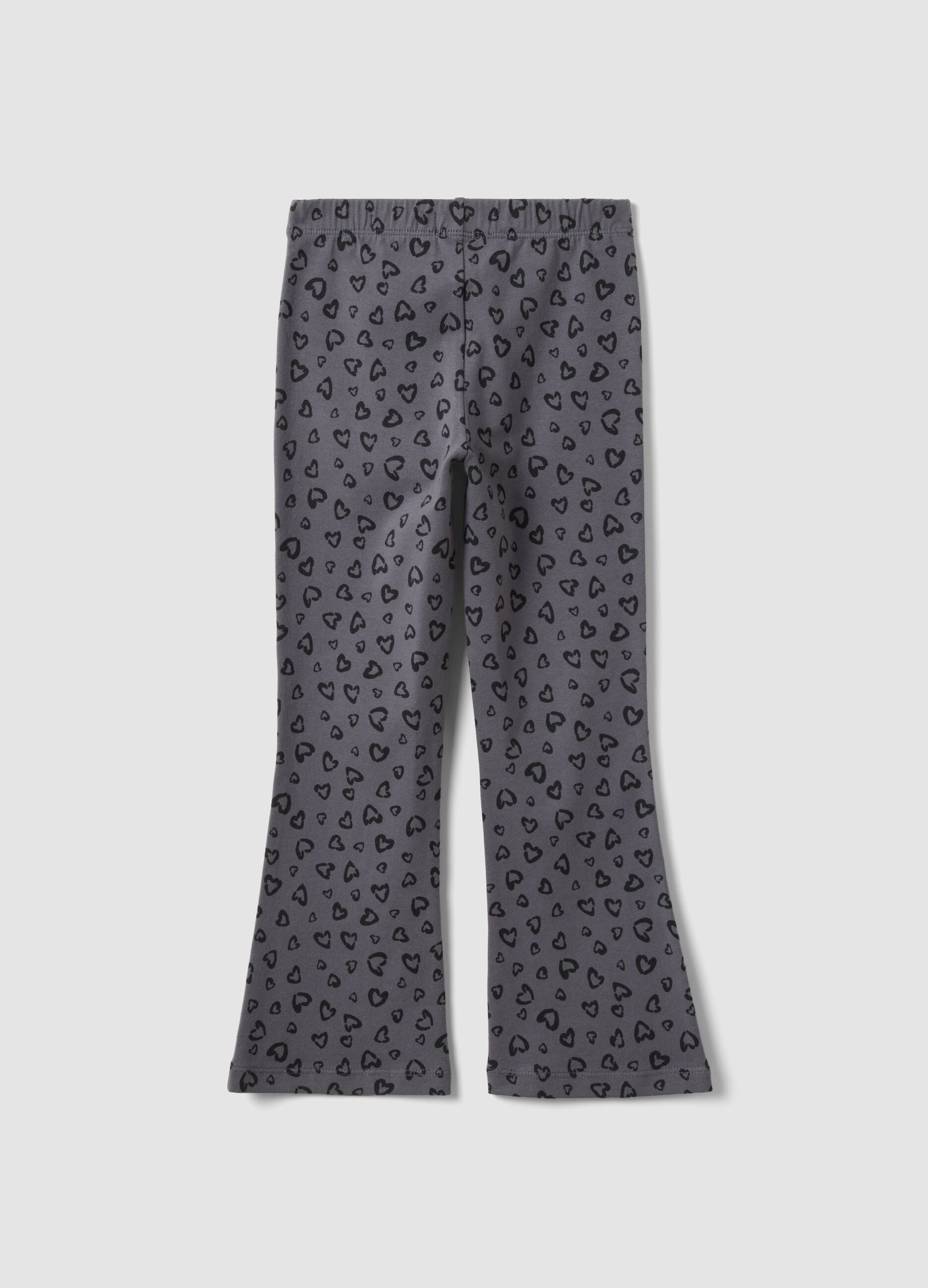 Leggings skinny cinzentas em algod&atilde;o org&acirc;nico com estampado de cora&ccedil;&otilde;es para menina