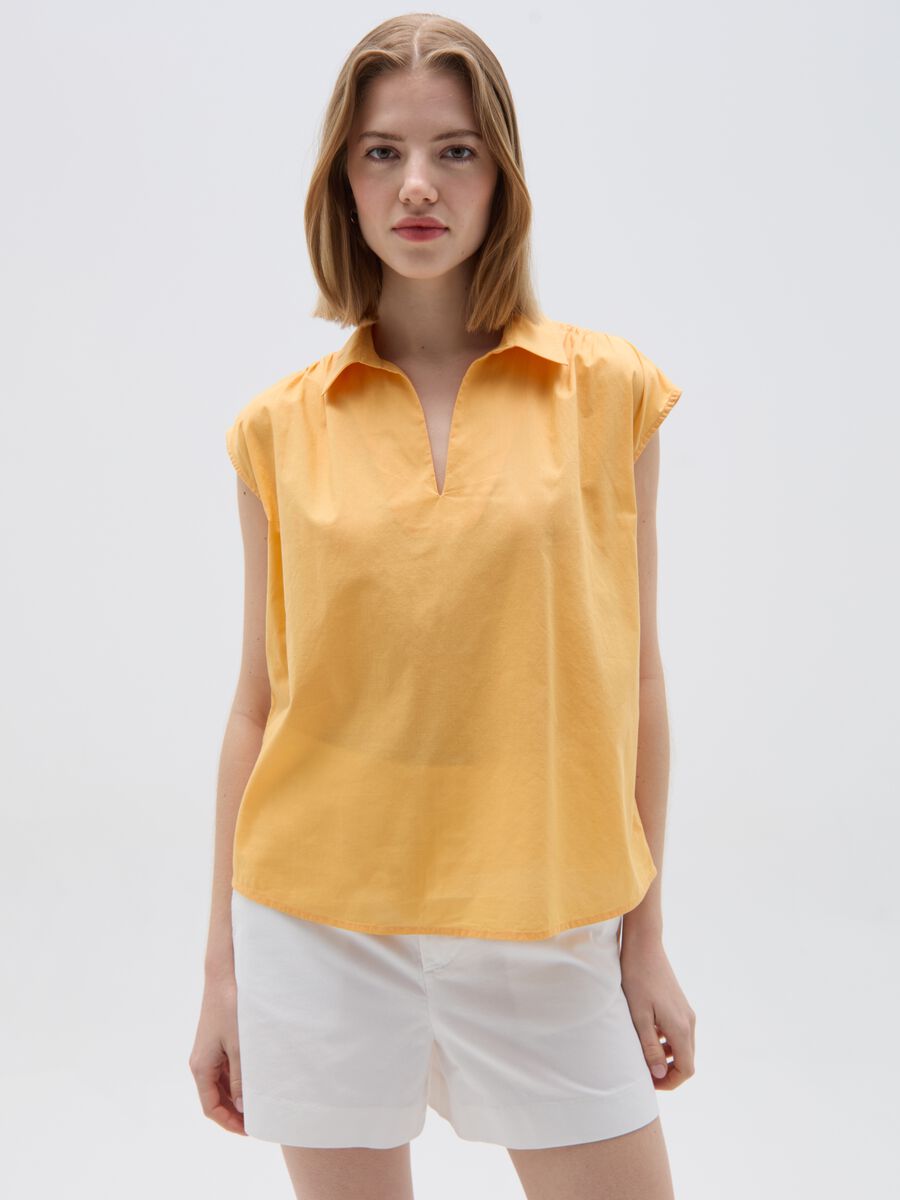 Sleeveless blouse with polo neck_0