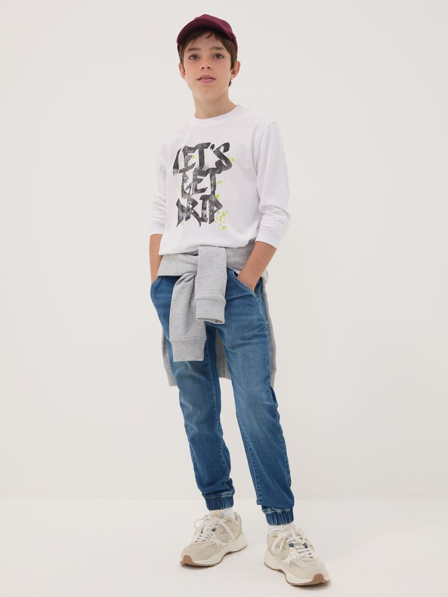 Blue stretch cotton jogger jeans with drawstring for boys_0