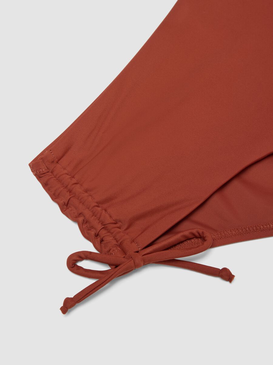 Orange stretch bikini bottoms with ruched side detailing_5