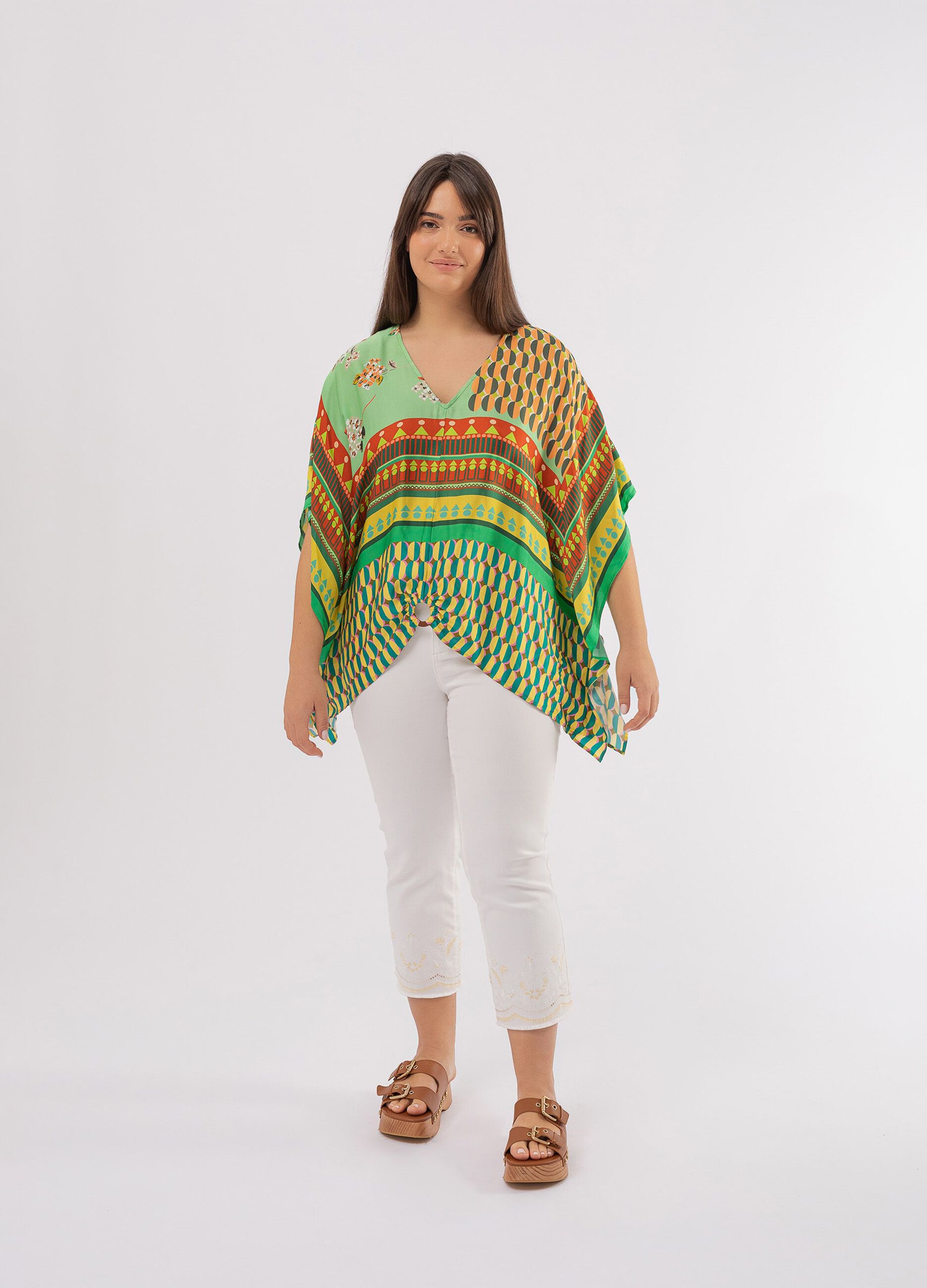 Curvy poncho with ring and multicoloured print