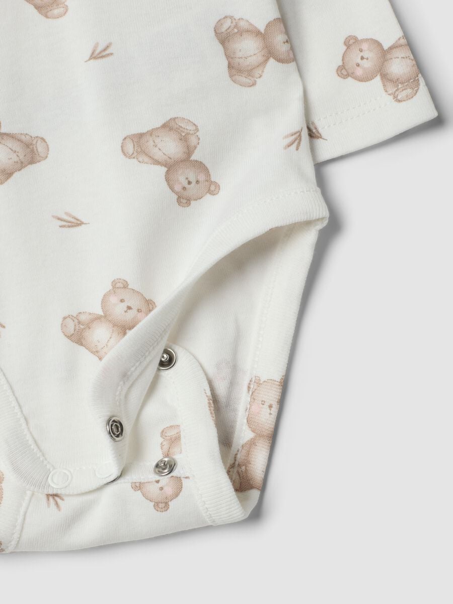 Set bianco in puro cotone organico con body e leggings stampati per neonati_3