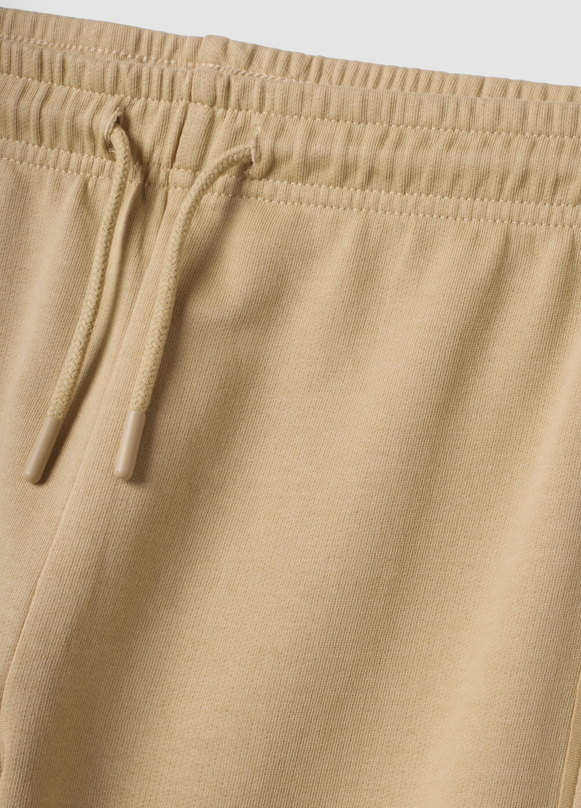 Pantaloni jogger beige in puro cotone