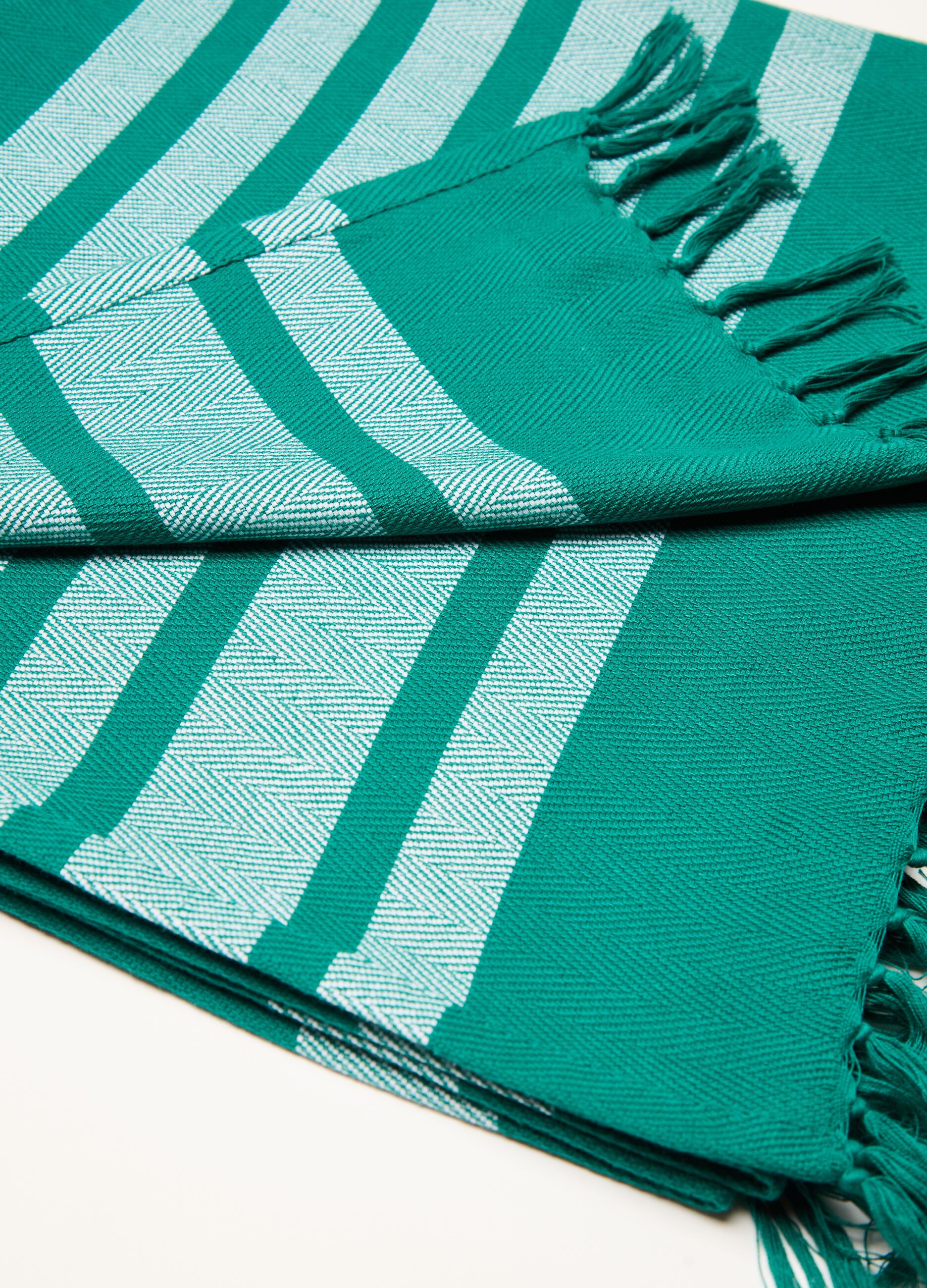 Beach towel with striped design