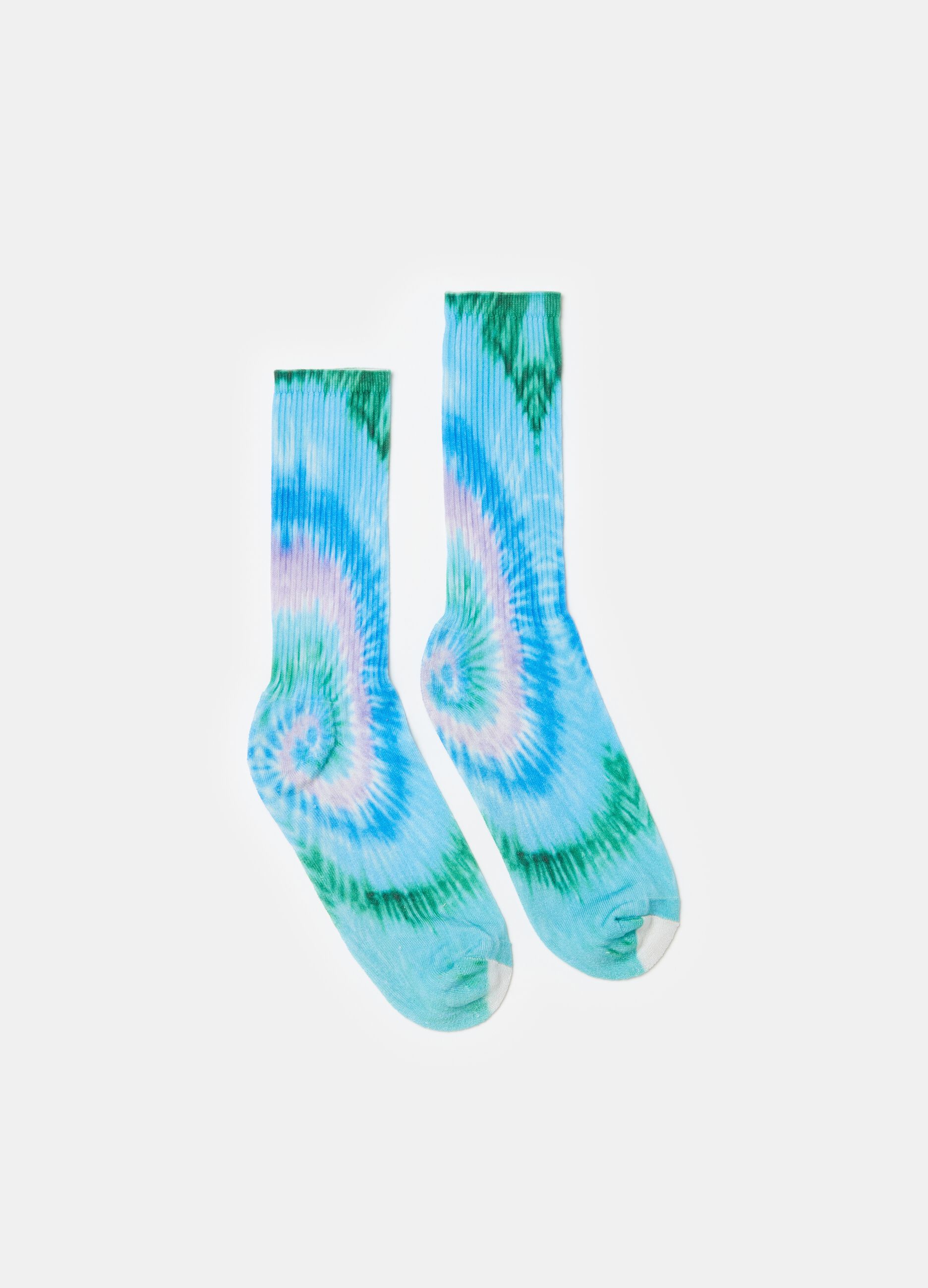 Long socks with tie dye pattern.