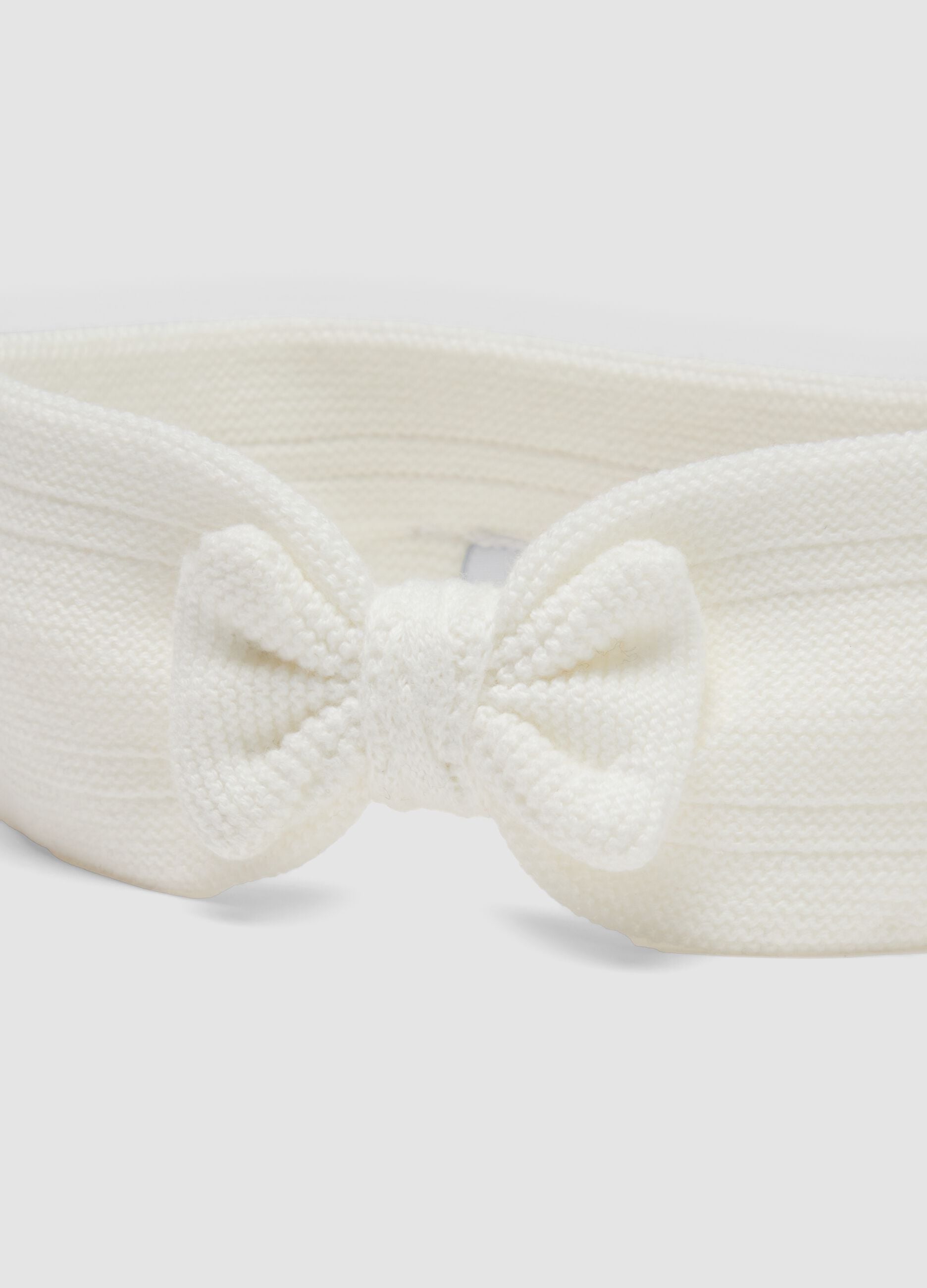 White organic cotton headband with knitted bow