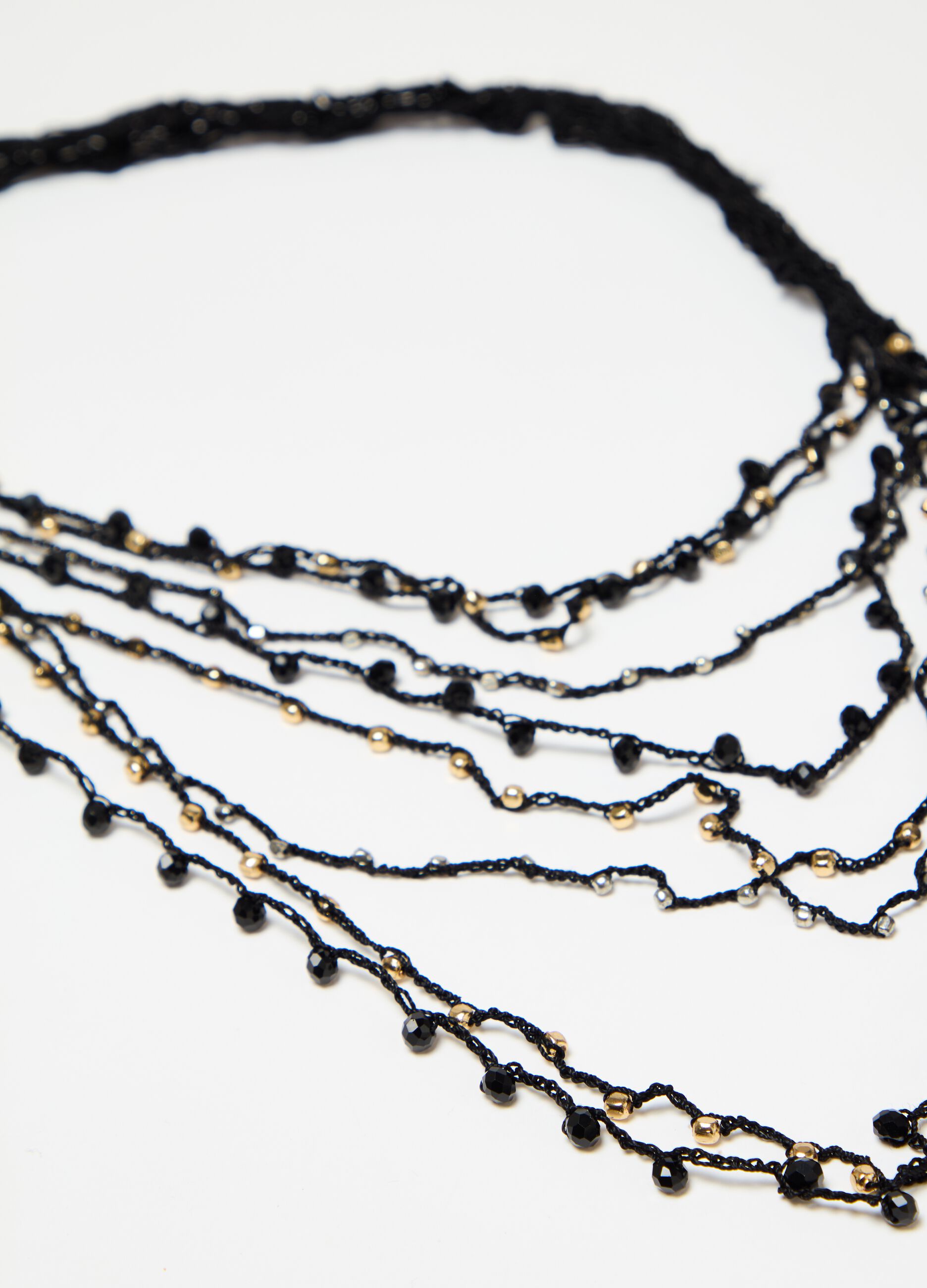 Long necklace with multi-string mesh