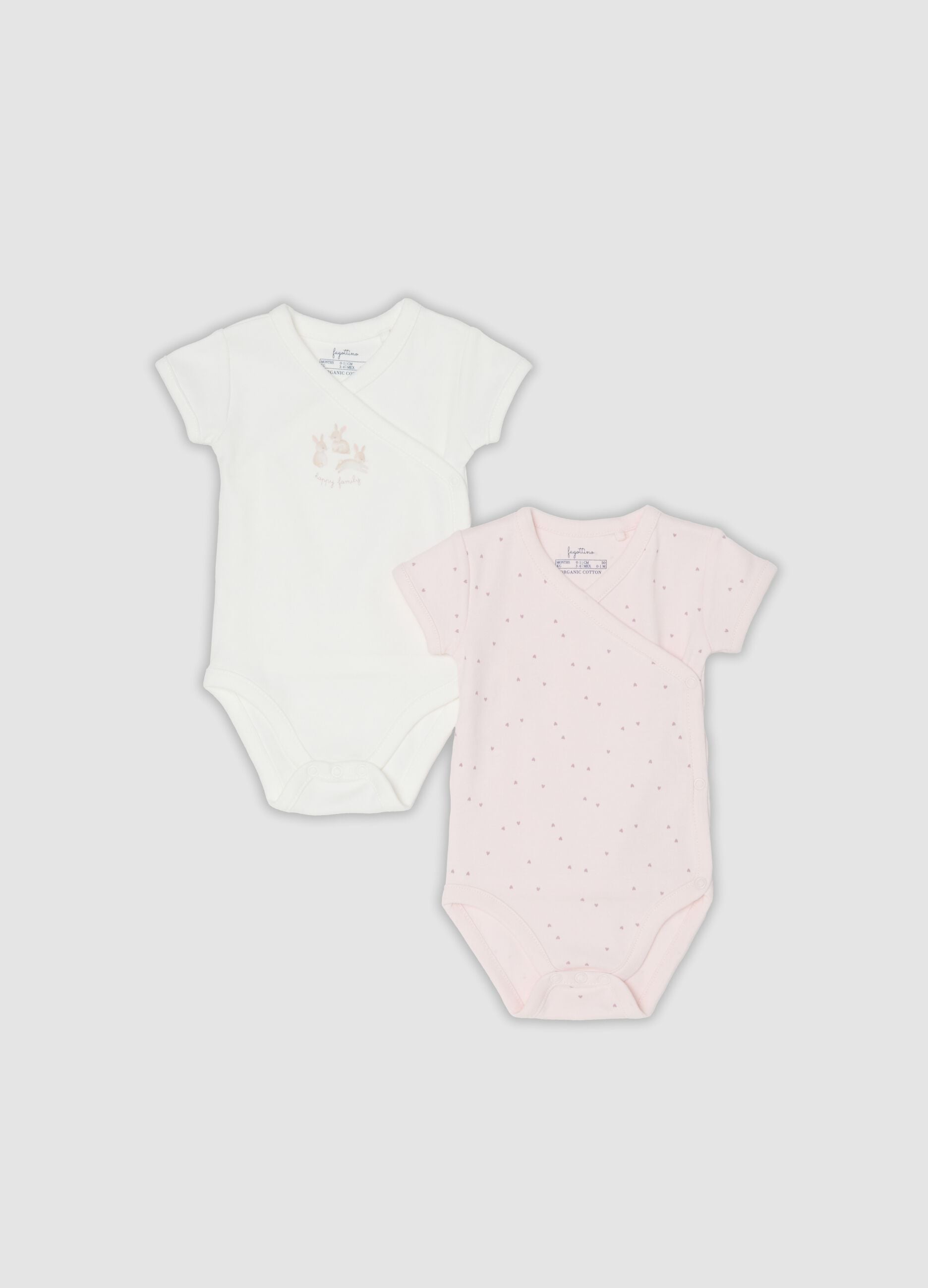 Two-pack of pink and white organic cotton short-sleeve bodysuits for baby girls