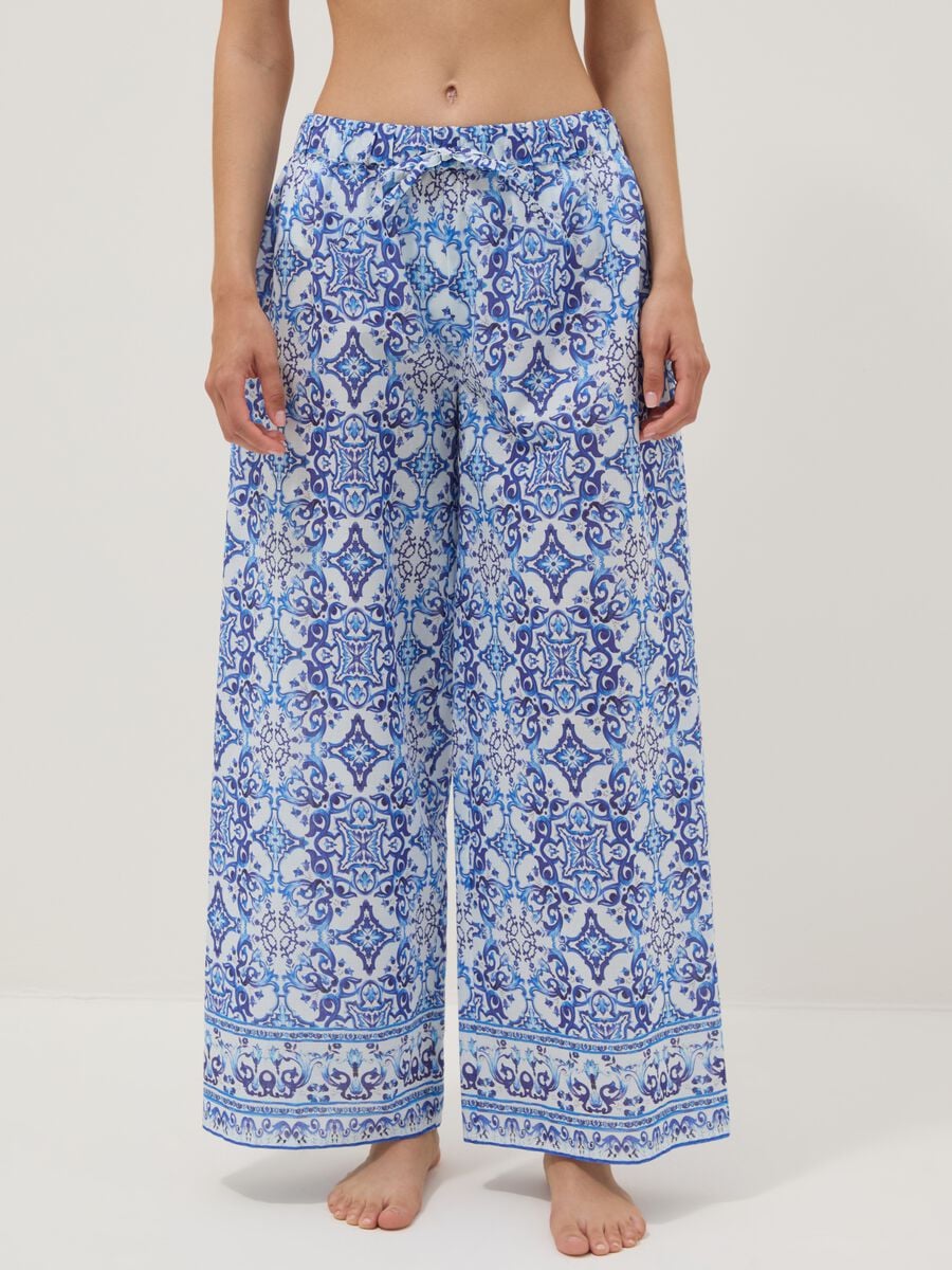 Blue pure cotton trousers with all-over print_1