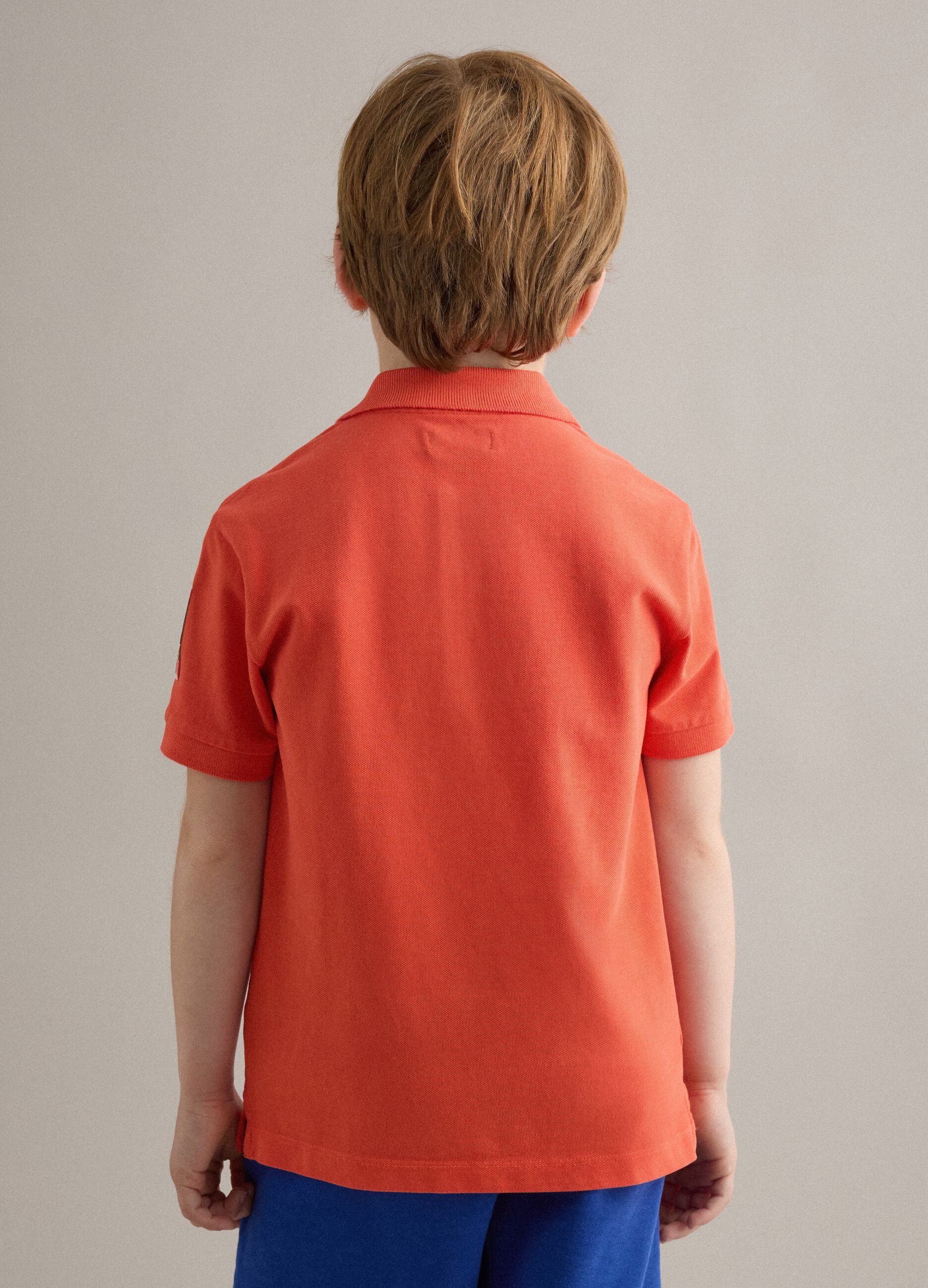 Orange pure cotton boys&rsquo; polo shirt, regular fit with patches