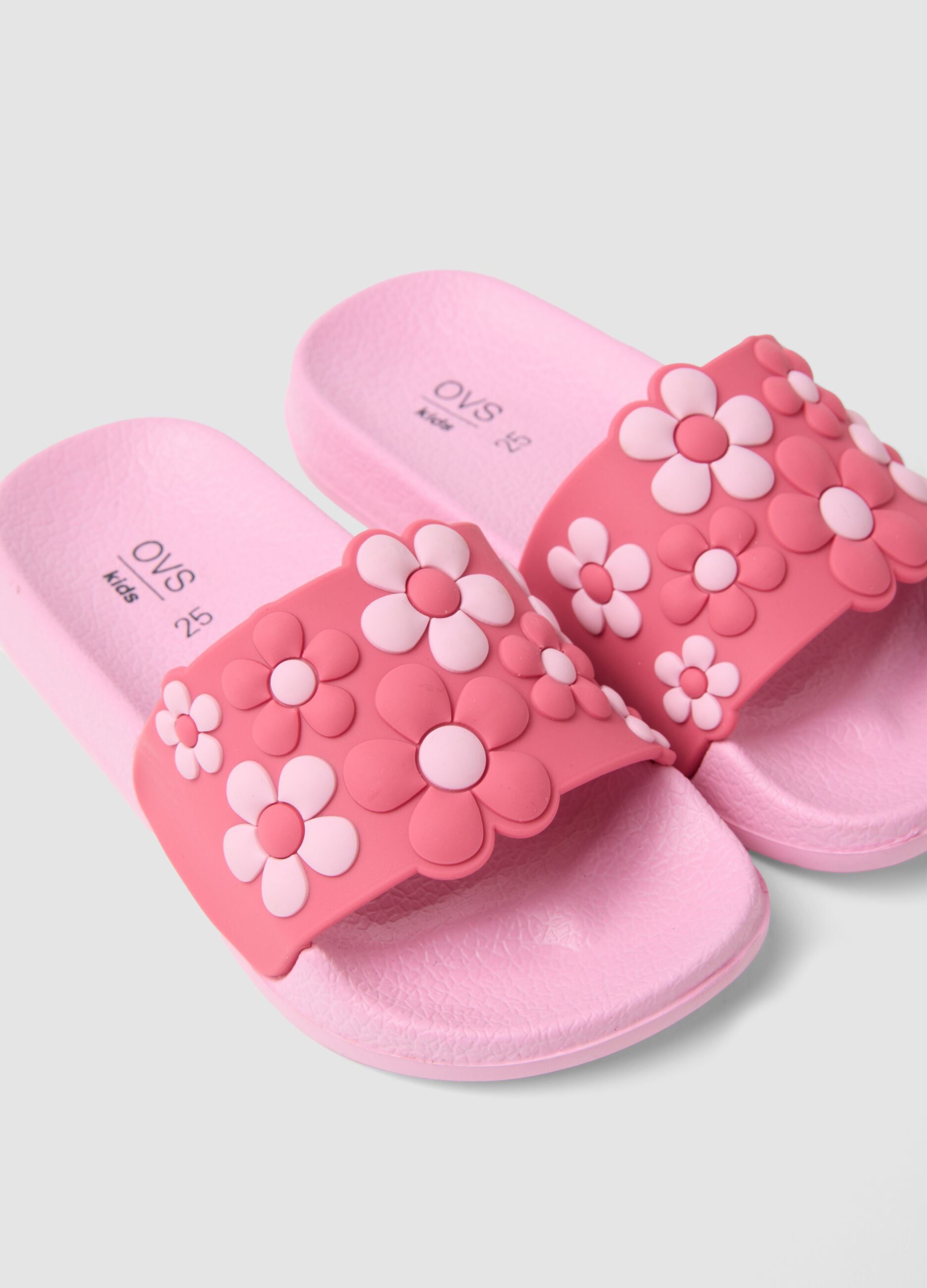 Pink sliders with floral appliqu&eacute;s