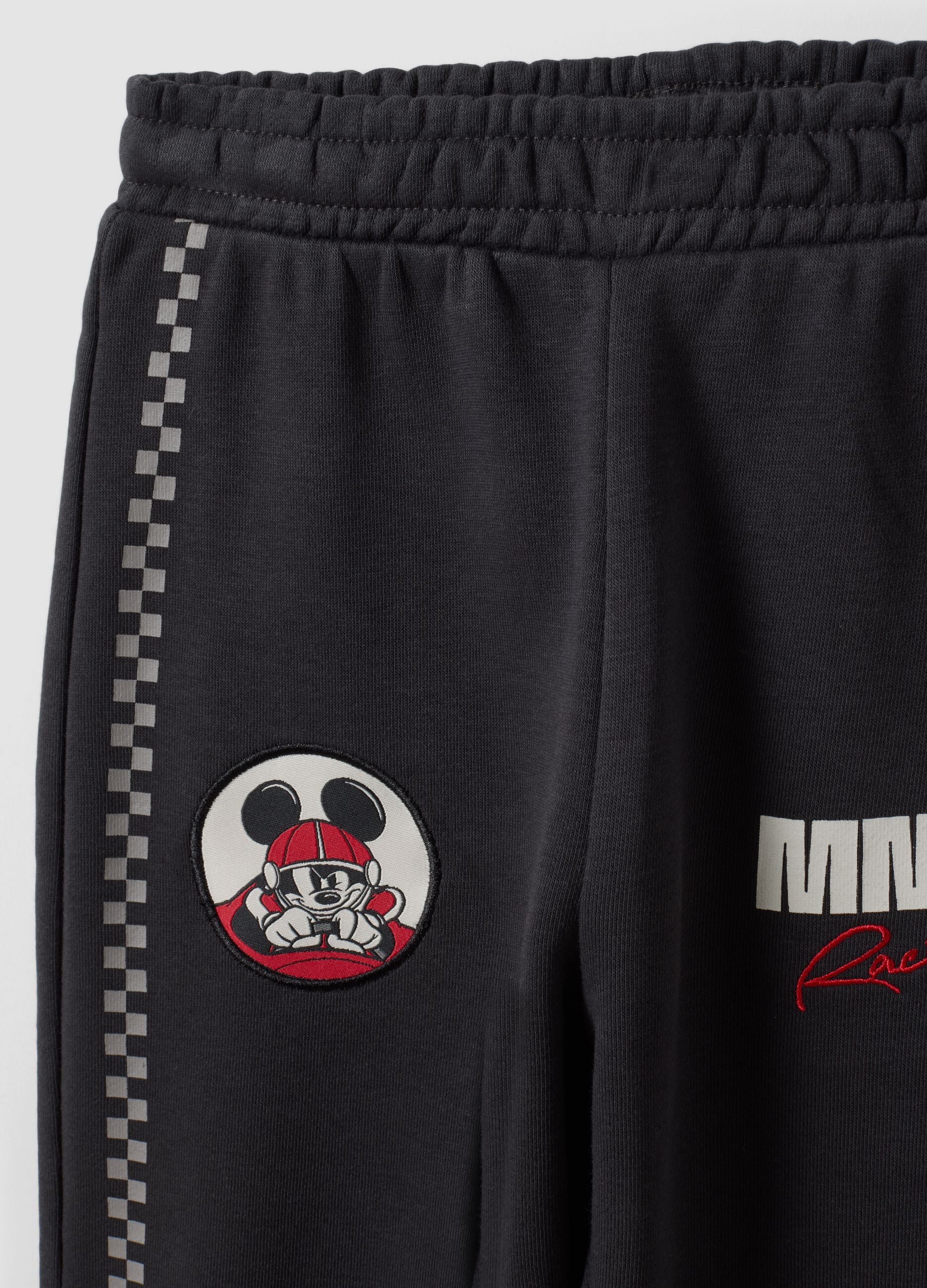 Black cotton-blend joggers with elasticated waist and Mickey print