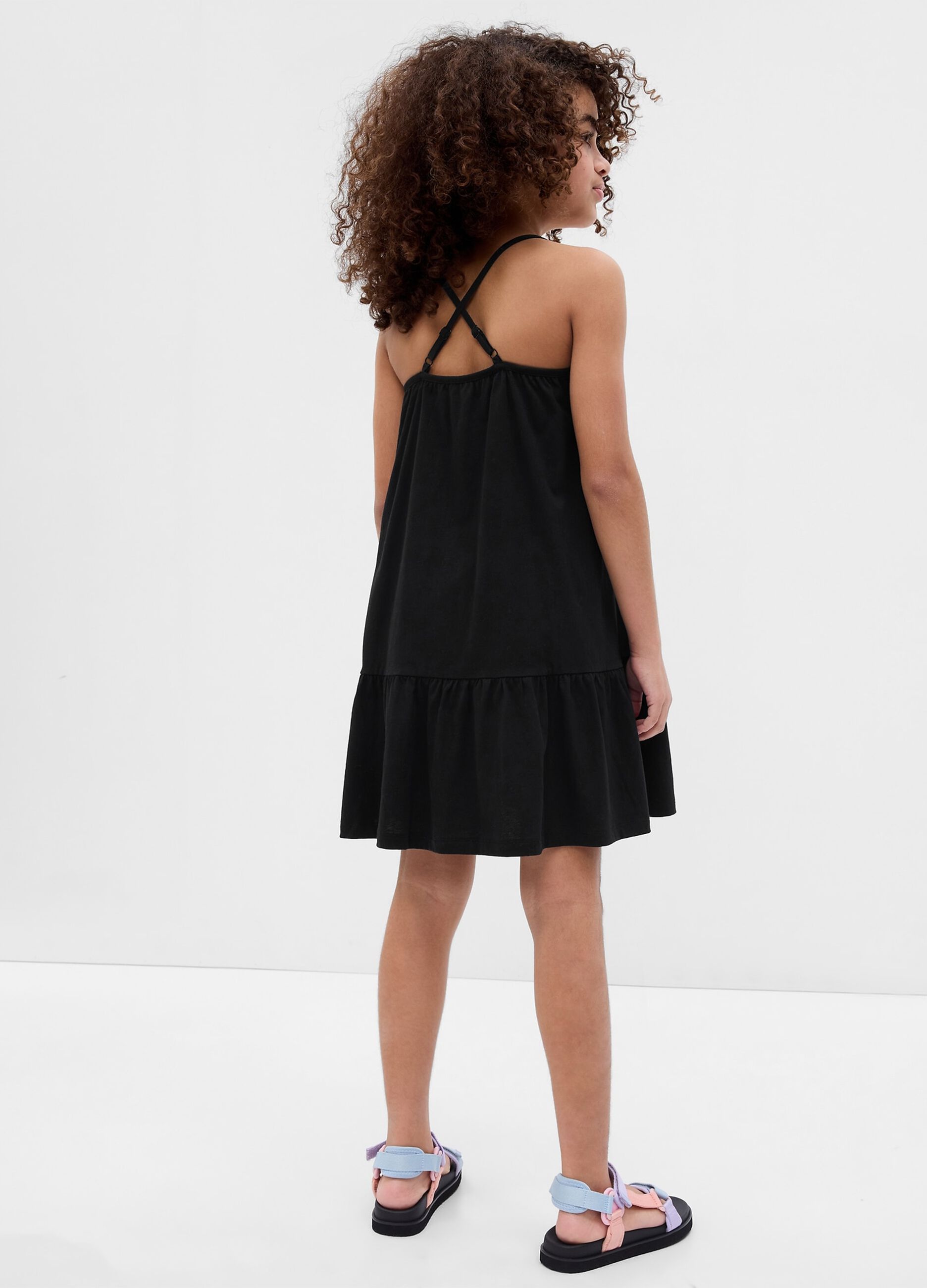 Short dress with flounce and crossover straps