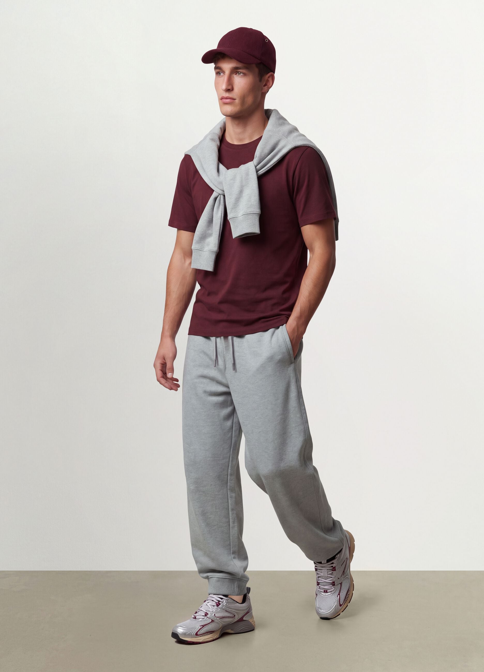 Grey cotton-blend joggers with cuffed hems and drawstring
