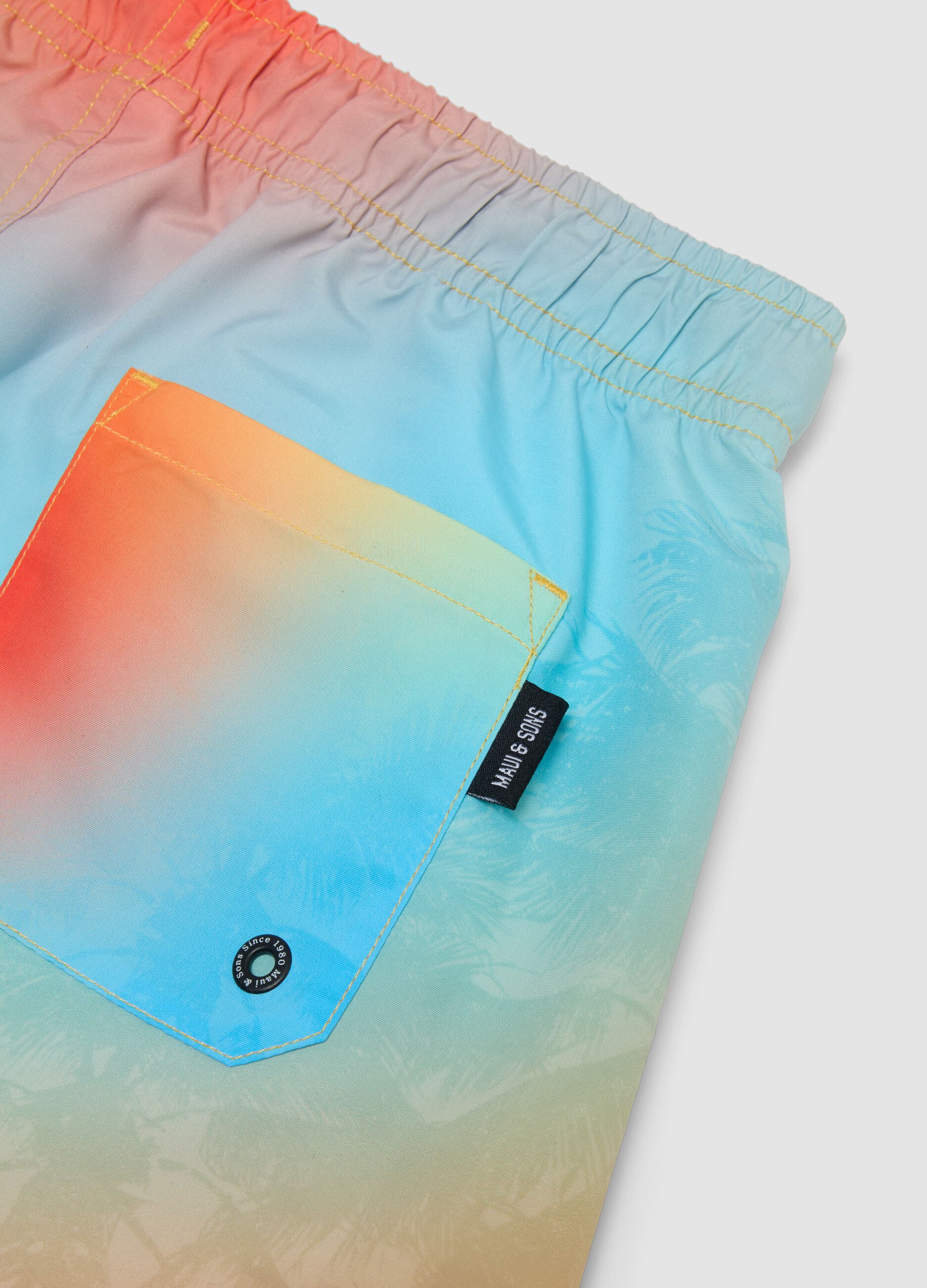 Jungen-Badeshorts in Multicolor mit Farbverlauf und Tropical-Print