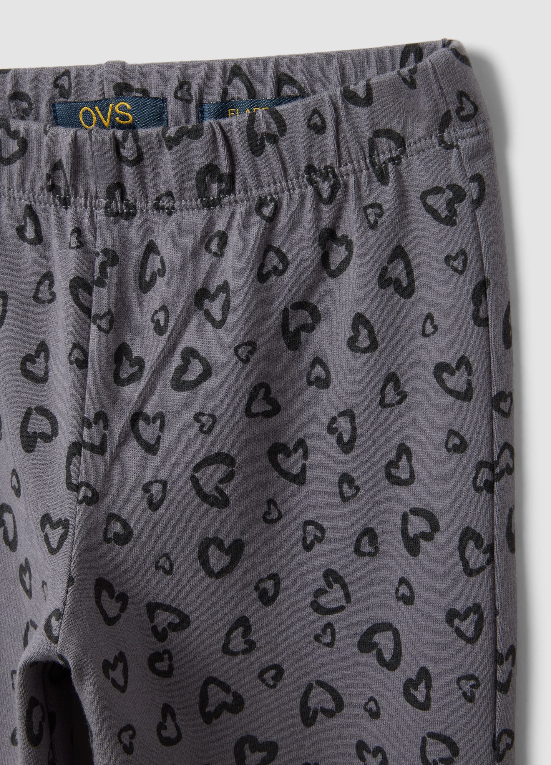 Leggings skinny cinzentas em algod&atilde;o org&acirc;nico com estampado de cora&ccedil;&otilde;es para menina