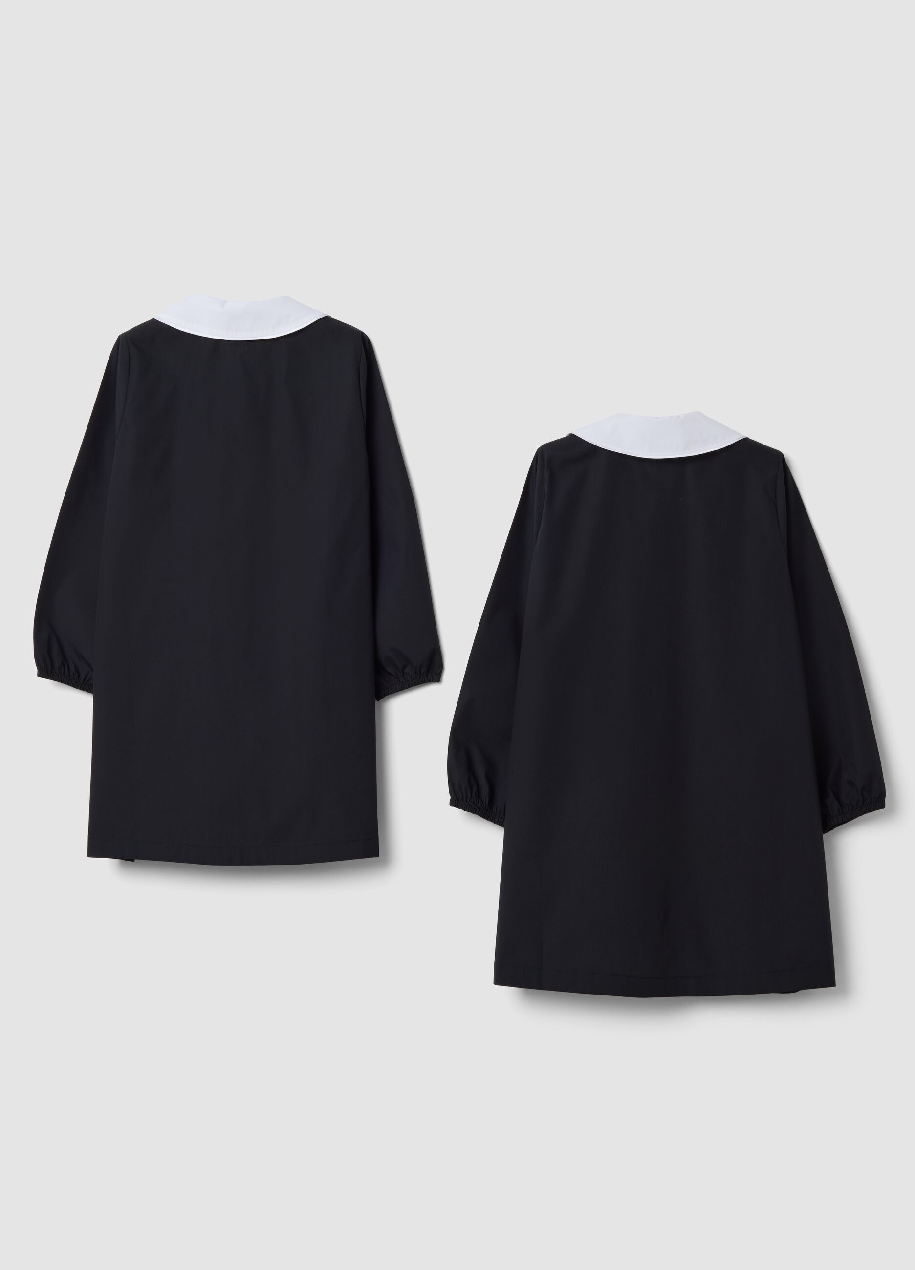 Two-pack of girls&rsquo; black school aprons with white button-up collar