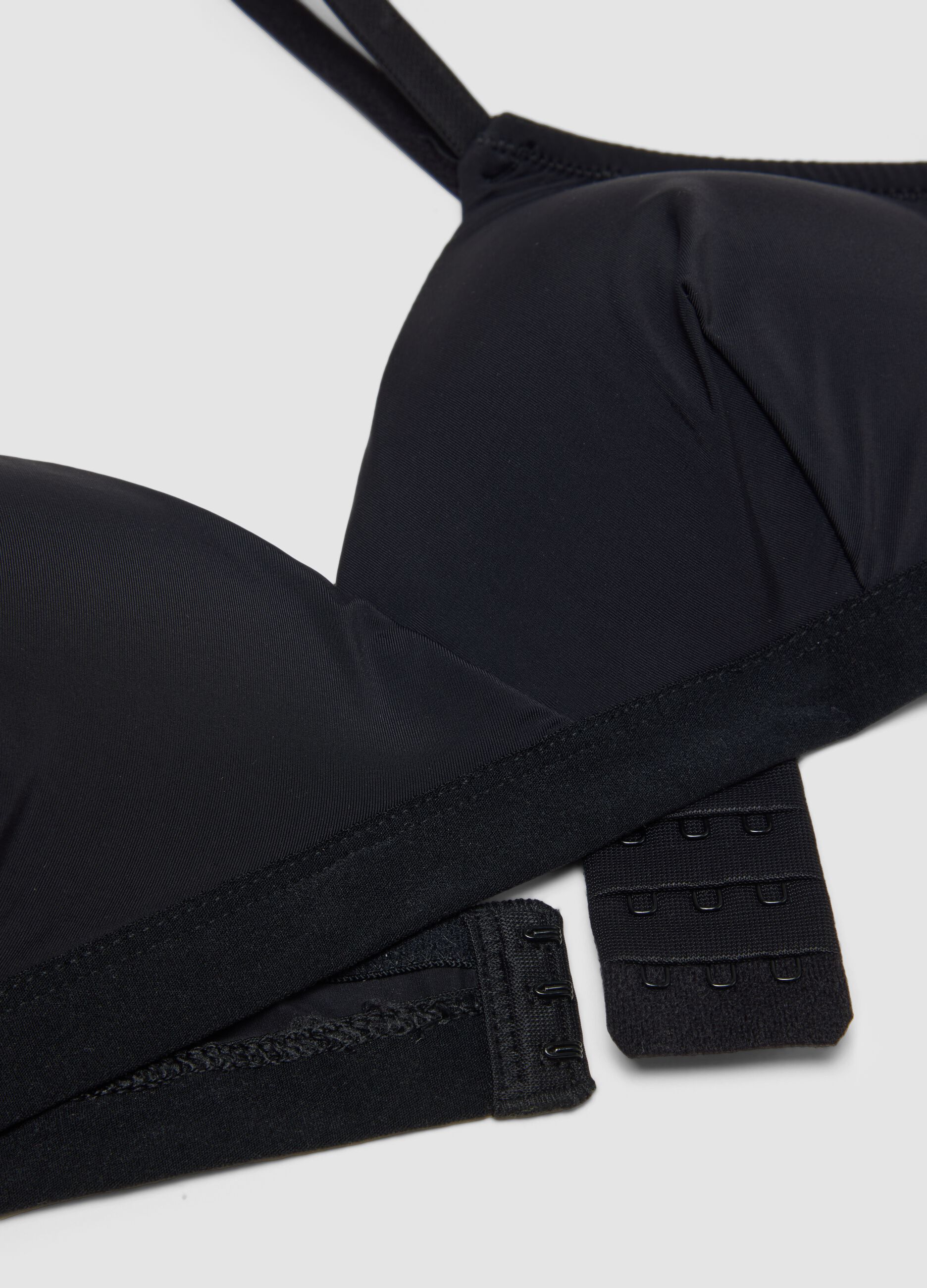 Black triangle bra with removable padding in stretch fabric