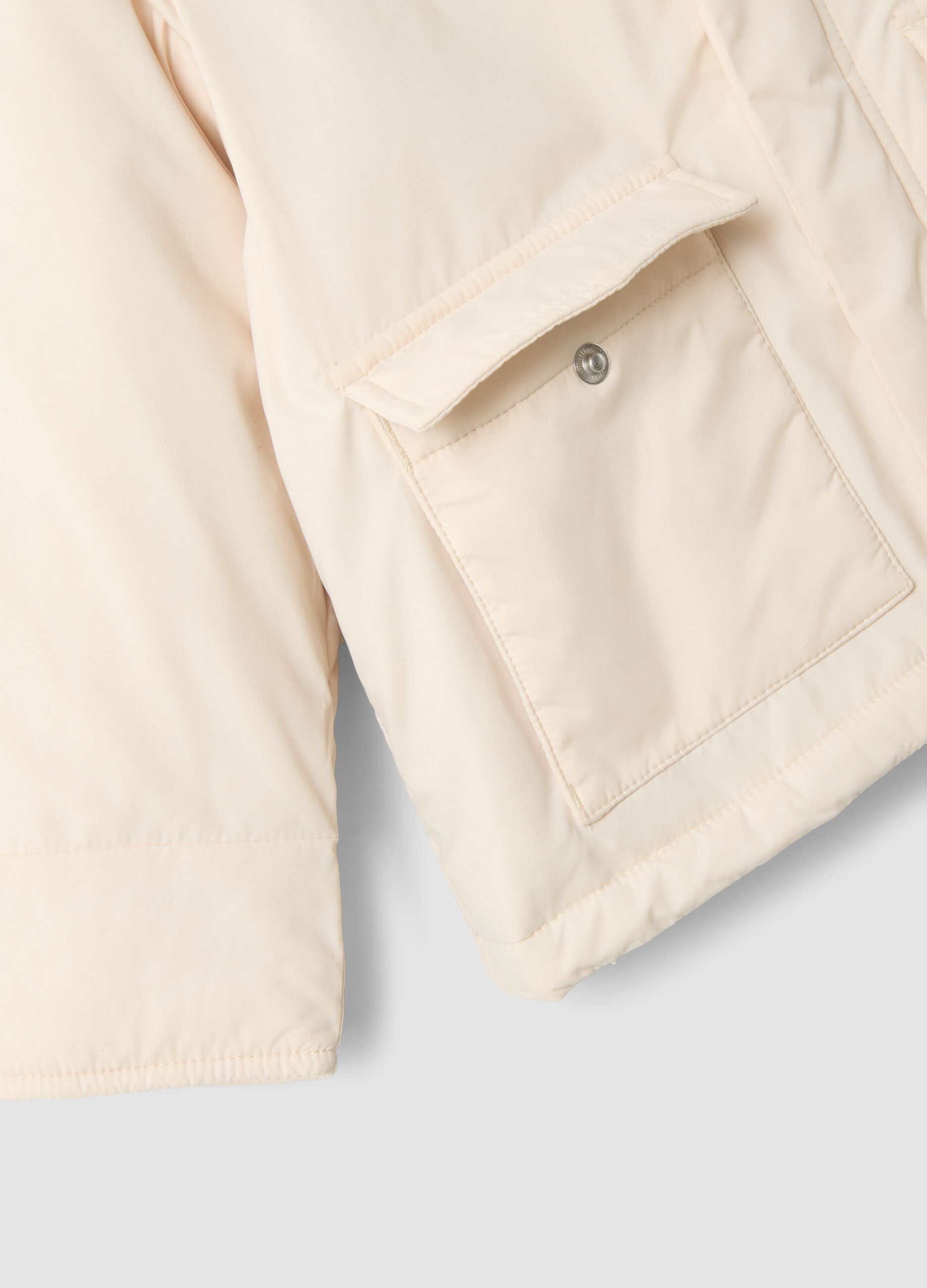 Pink padded hooded jacket with animal-print lining