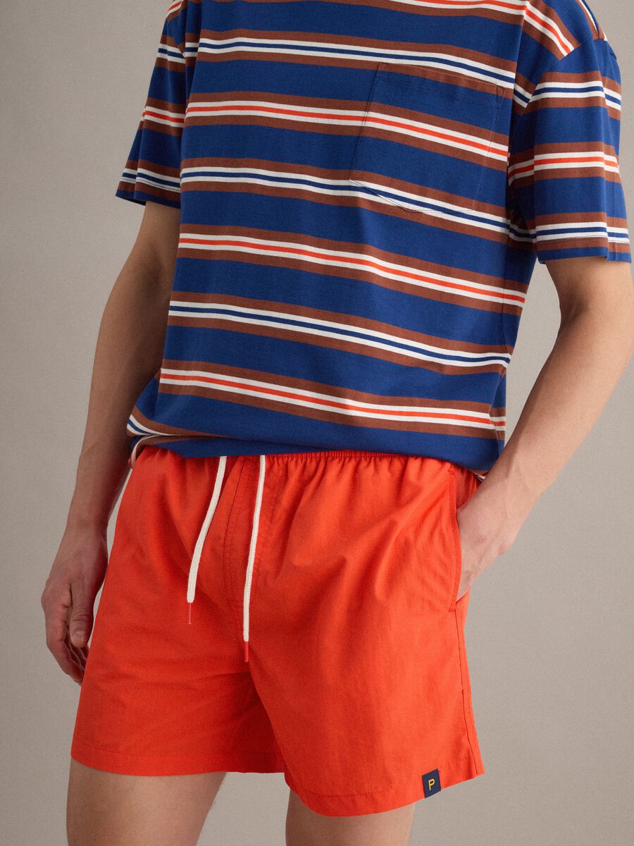 Orange swim shorts with elasticated waistband and drawstring_3