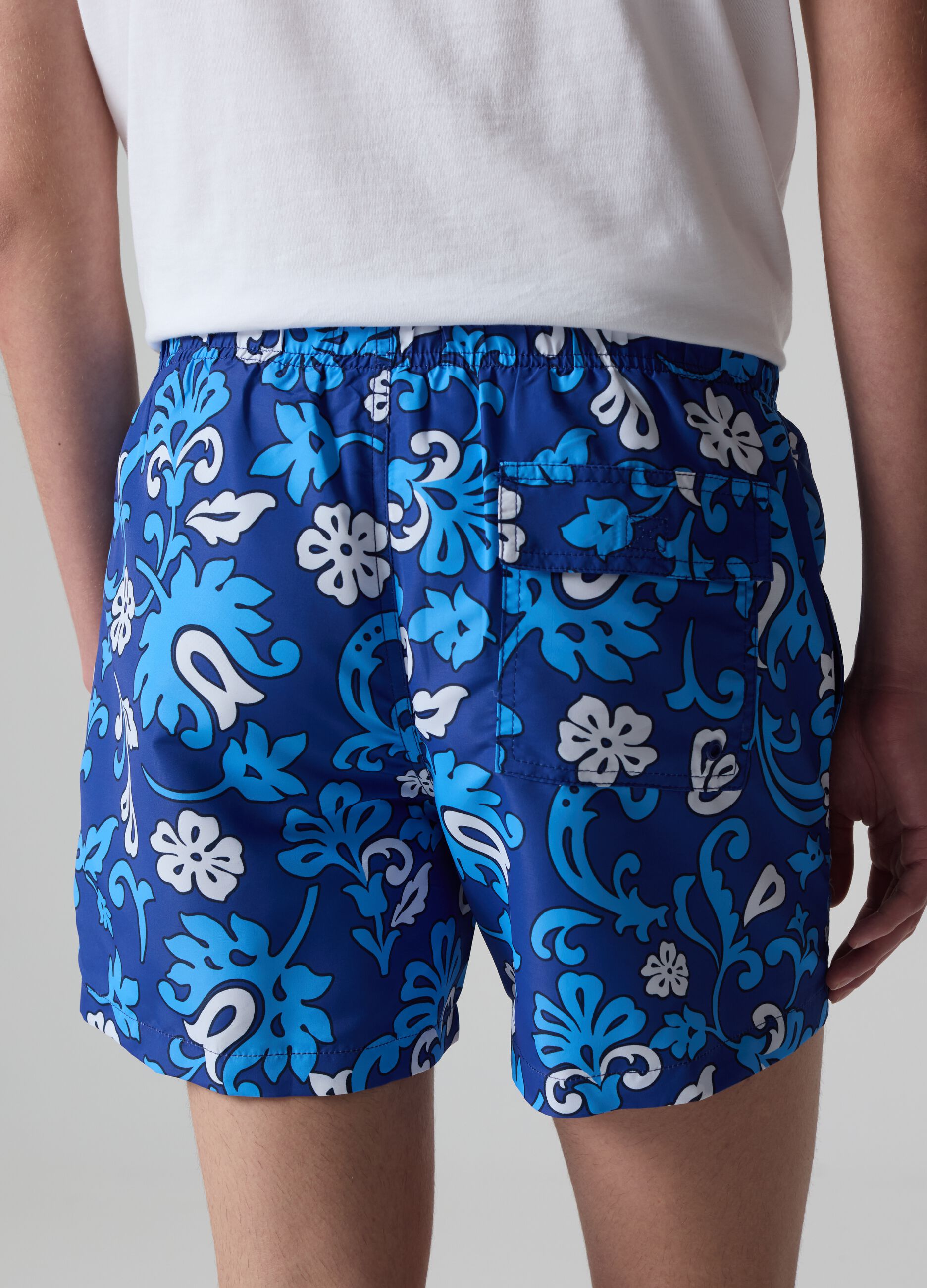 Bermuda swim shorts with floral print