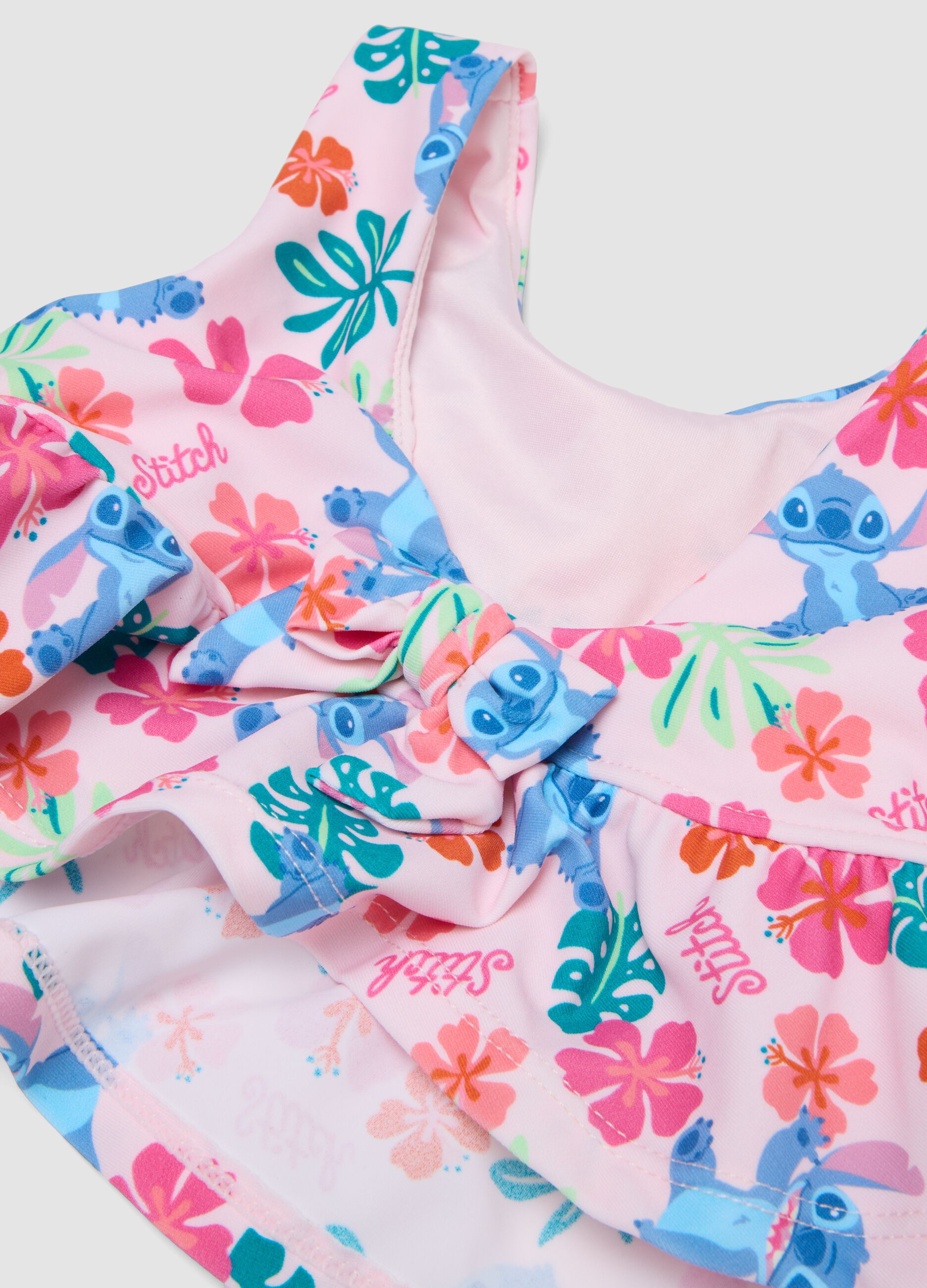 Biqu&iacute;ni rosa em tecido el&aacute;stico com folhos