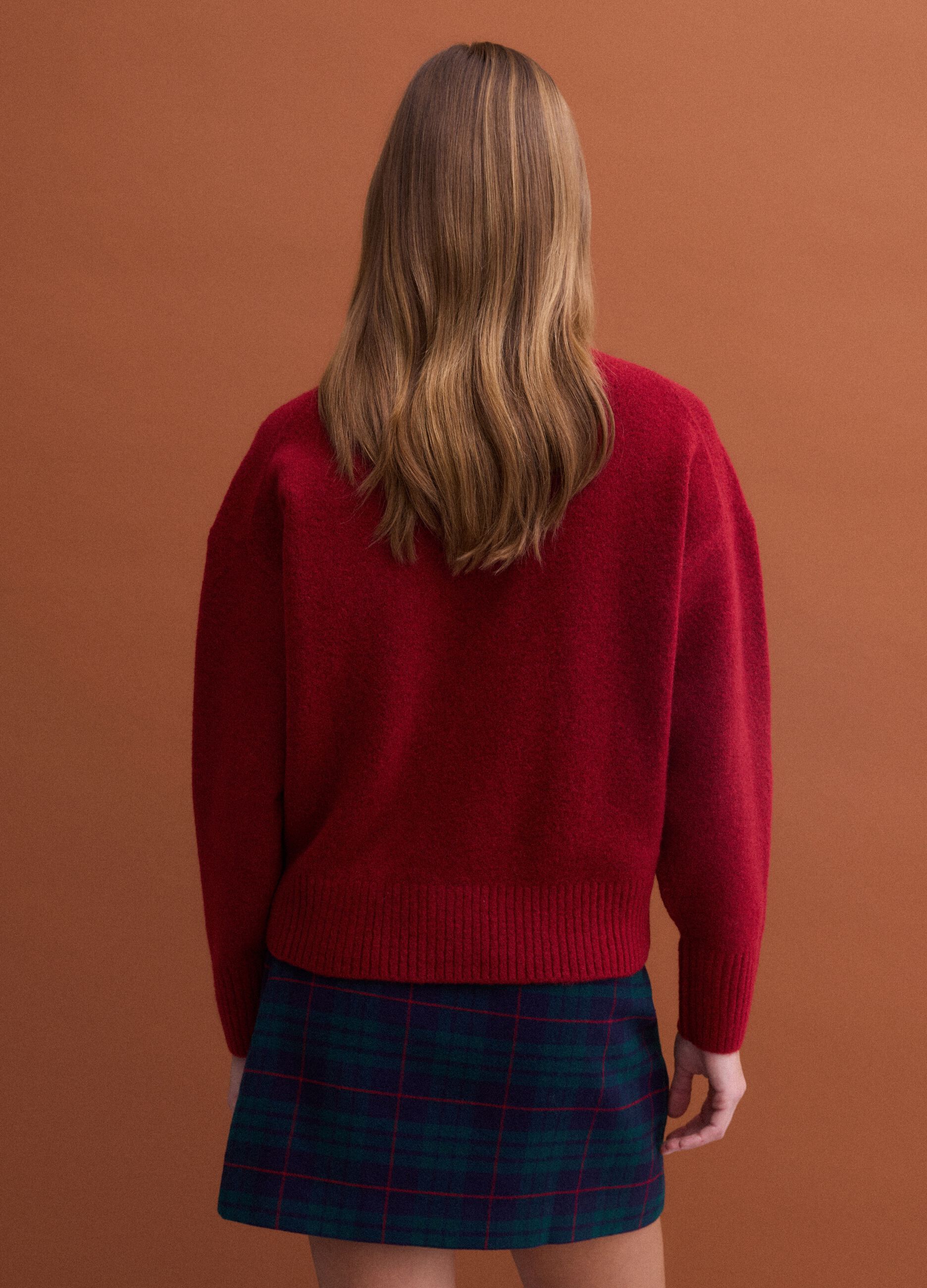 Red stretch wool jumper with raised neck