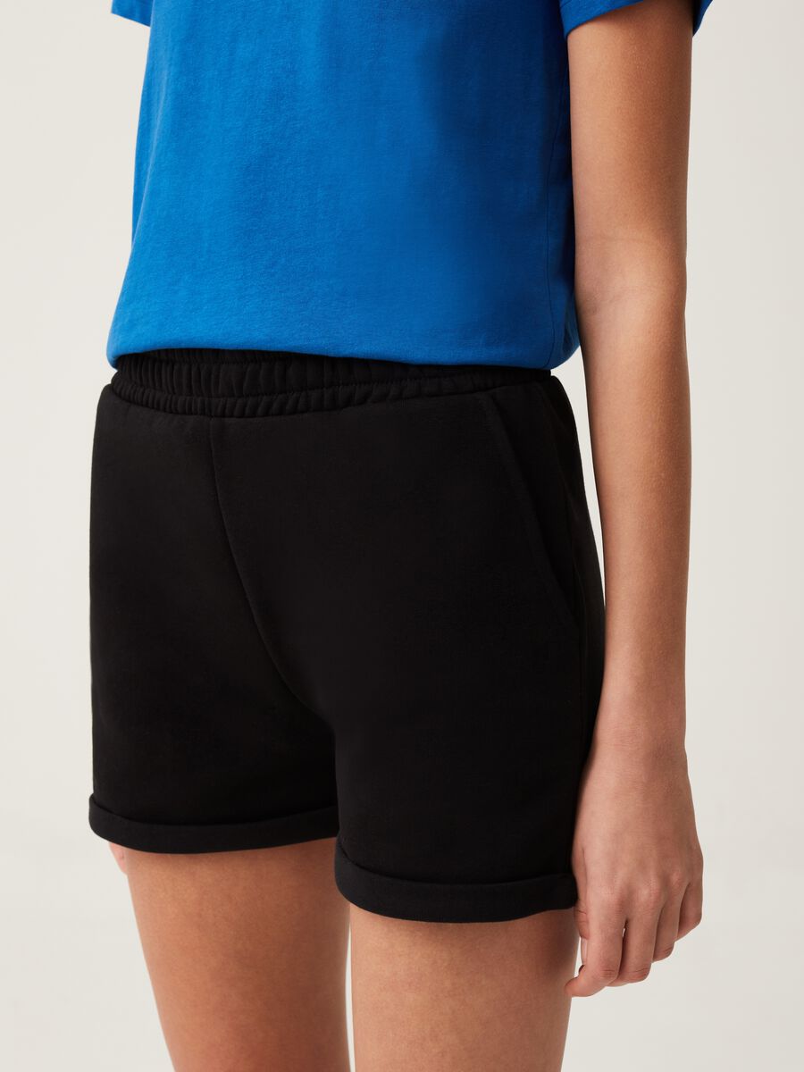 Fitness shorts in French terry with turn-ups_1