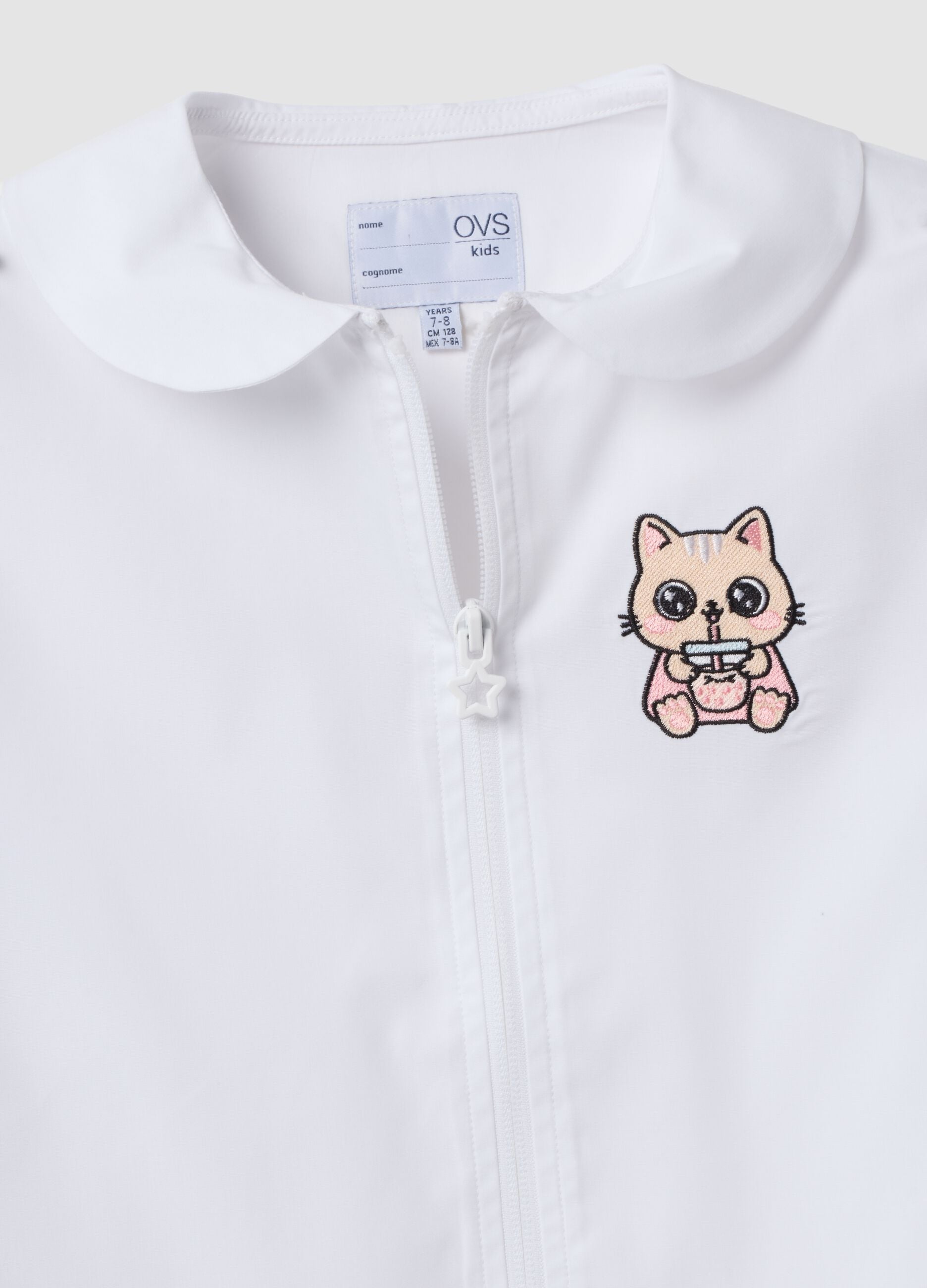 White girls&rsquo; school apron with zip and kitten embroidery