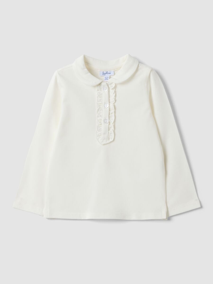 Polo bianca in cotone organico elasticizzato con dettagli volant per bimba_0