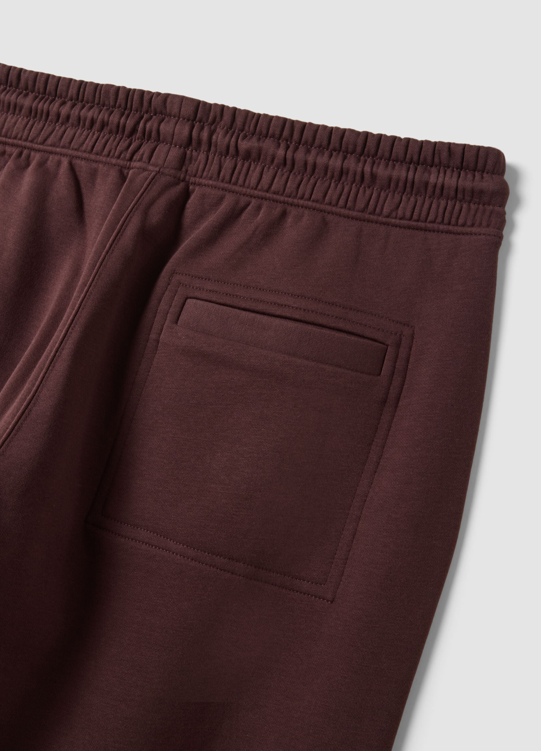 Jogger marroni in misto cotone con fondo a polsino e coulisse