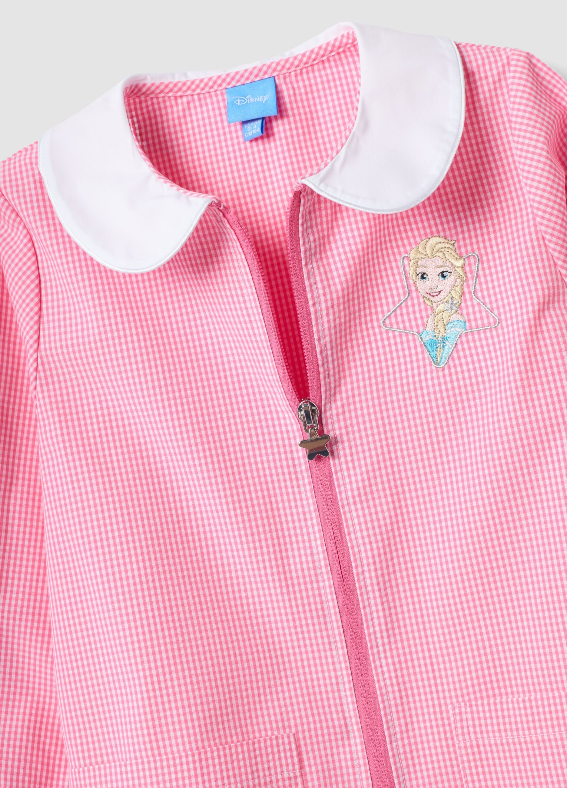 Pink gingham nursery apron with zip, white collar and Frozen embroidery